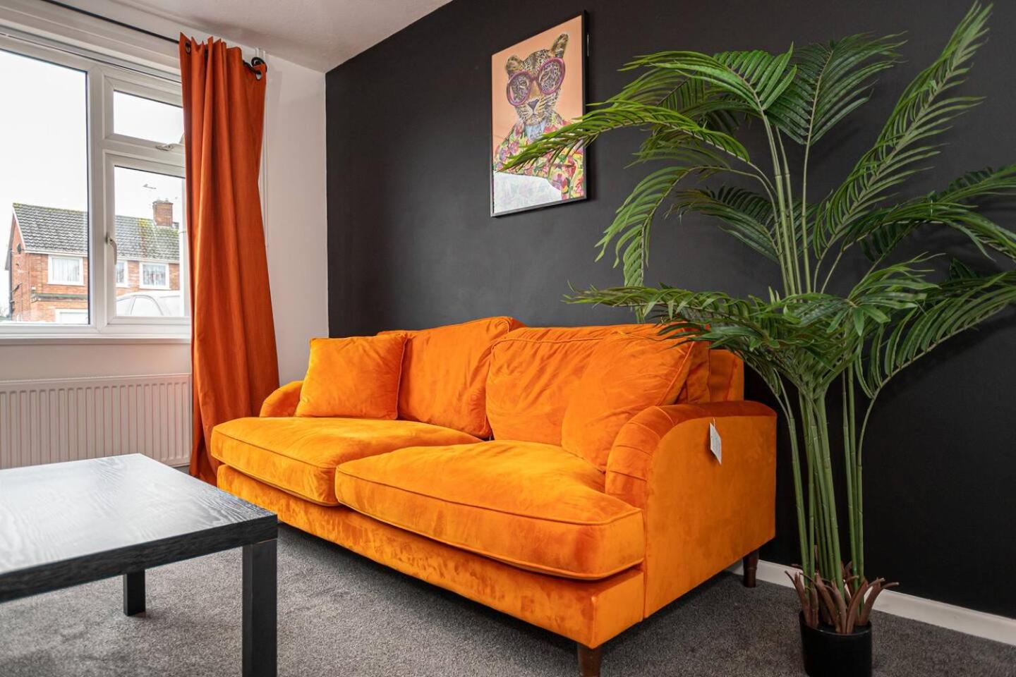Spacious 4-Bed House with Parking Near City Centre