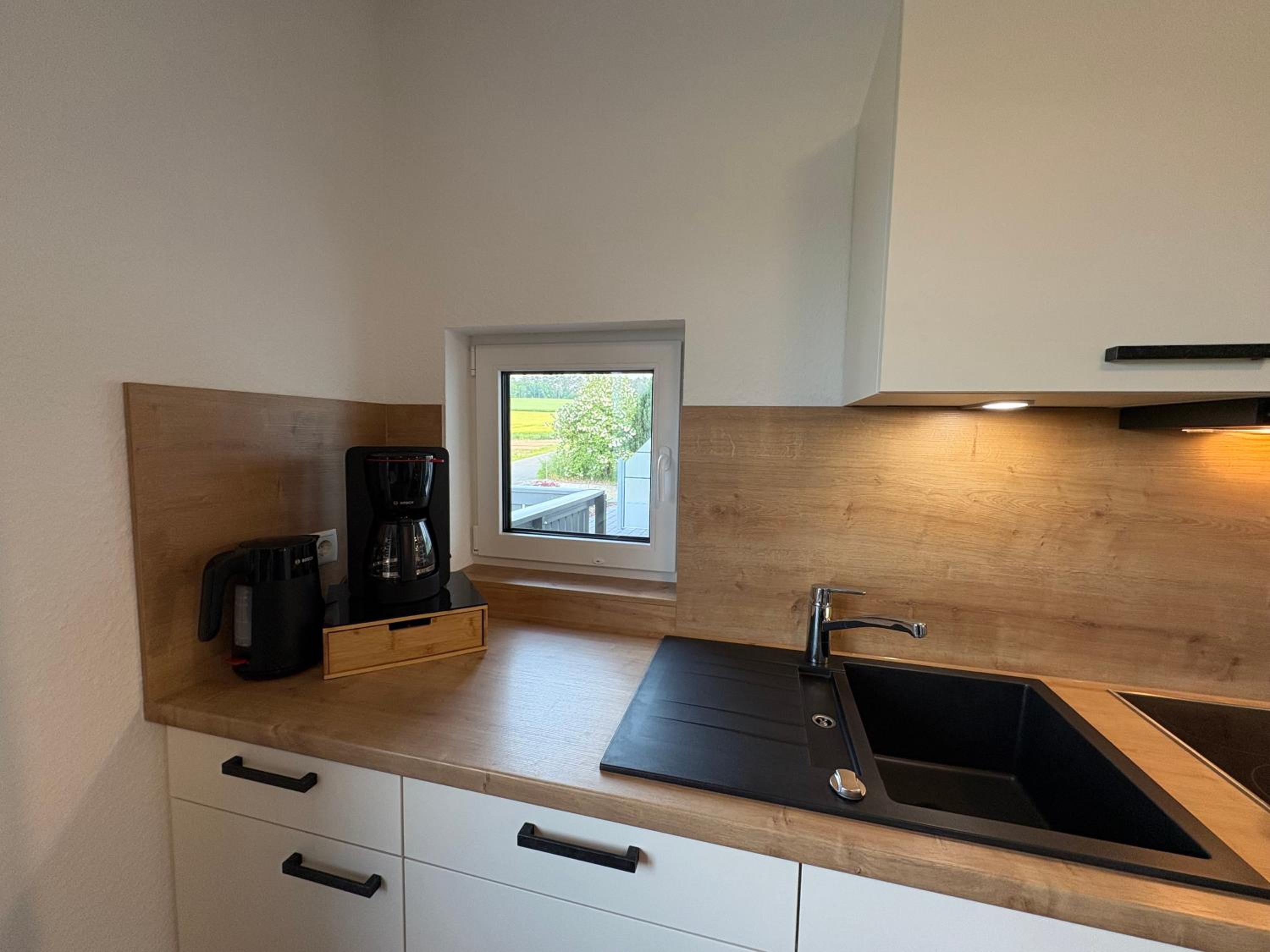 Familien-Apartment Bodanum für 4 Personen - mit eigener Terrasse - naturnahe Ortsrandlage - Arbeitsplatz mit VDSL - 10 min zum Nürburgring
