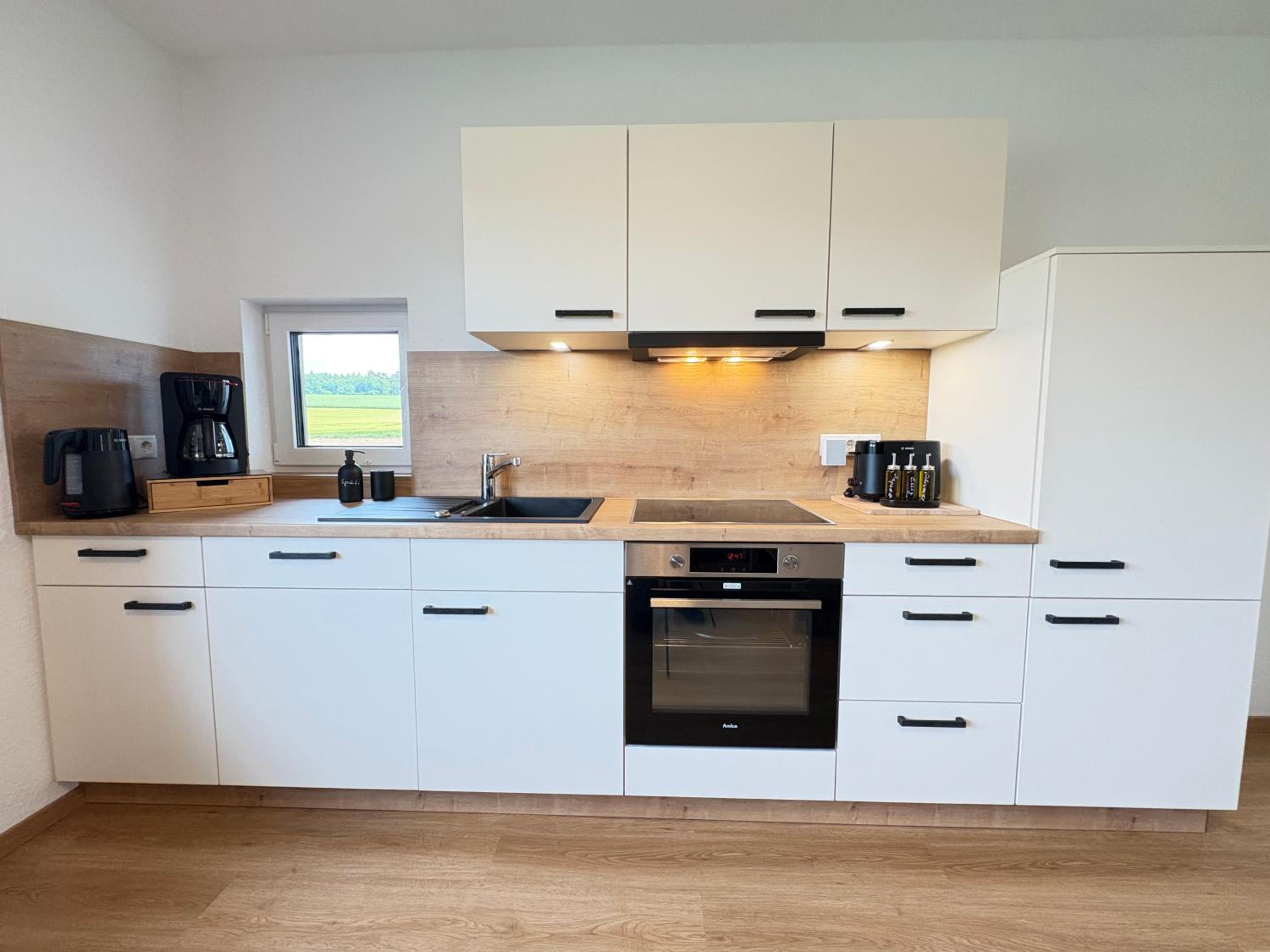 Familien-Apartment Bodanum für 4 Personen - mit eigener Terrasse - naturnahe Ortsrandlage - Arbeitsplatz mit VDSL - 10 min zum Nürburgring