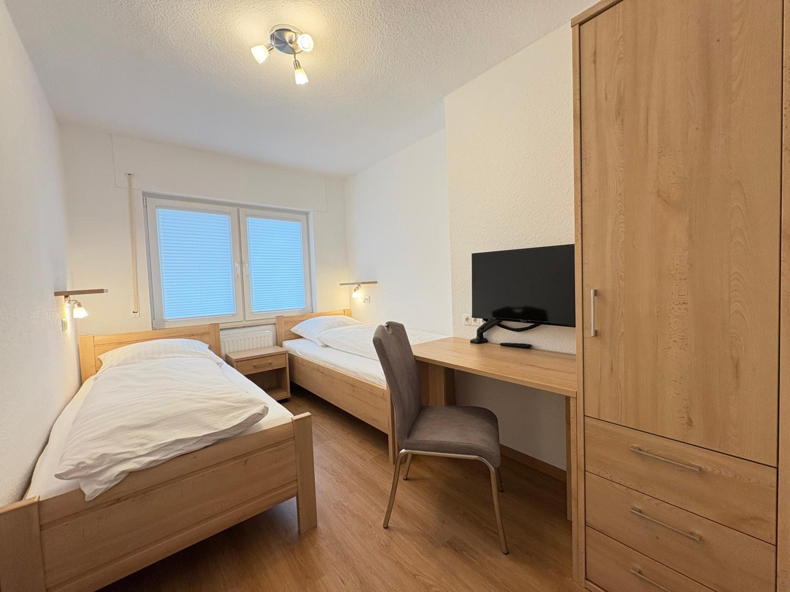 Familien-Apartment Bodanum für 4 Personen - mit eigener Terrasse - naturnahe Ortsrandlage - Arbeitsplatz mit VDSL - 10 min zum Nürburgring
