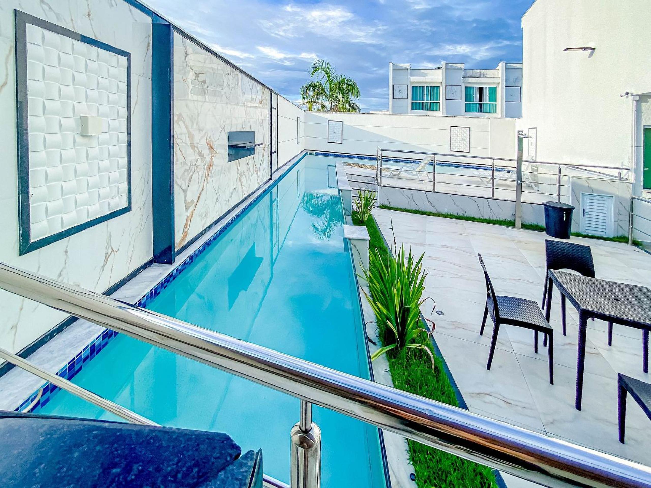 Casa com 4 quartos em condomínio com piscina e área gourmet próximo à praia de Taperapuã