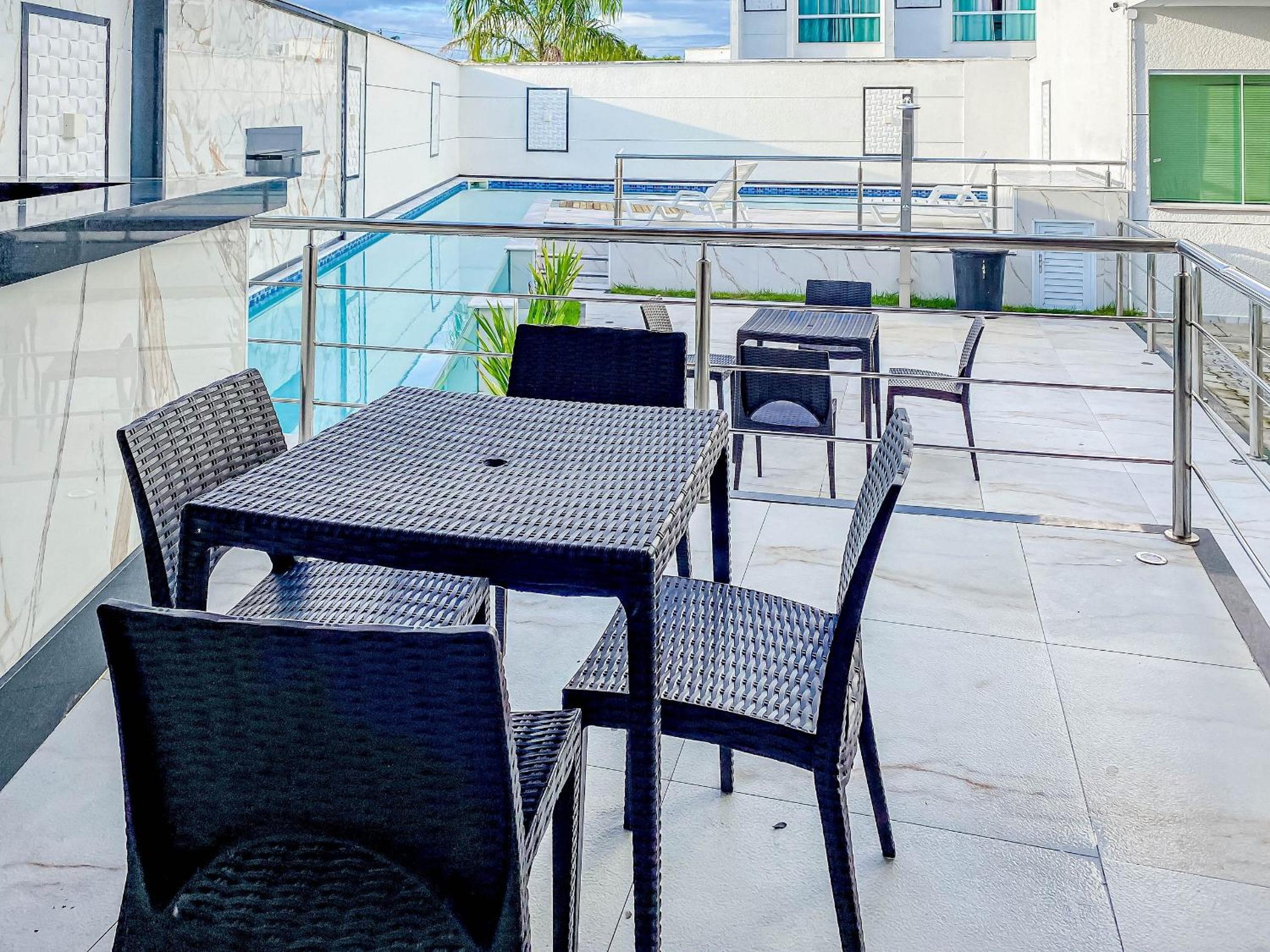 Casa com 4 quartos em condomínio com piscina e área gourmet próximo à praia de Taperapuã
