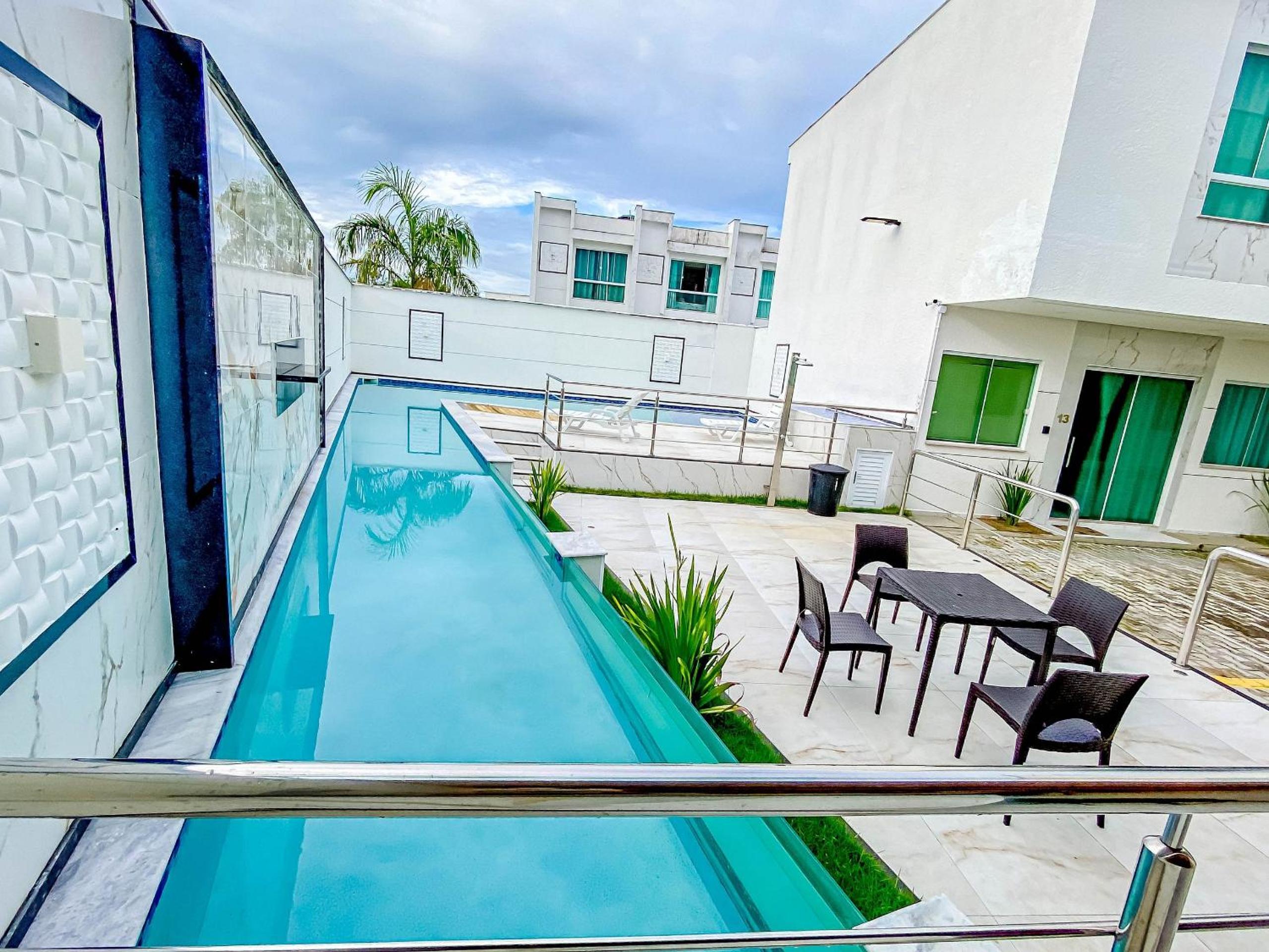 Casa com 4 quartos em condomínio com piscina e área gourmet próximo à praia de Taperapuã