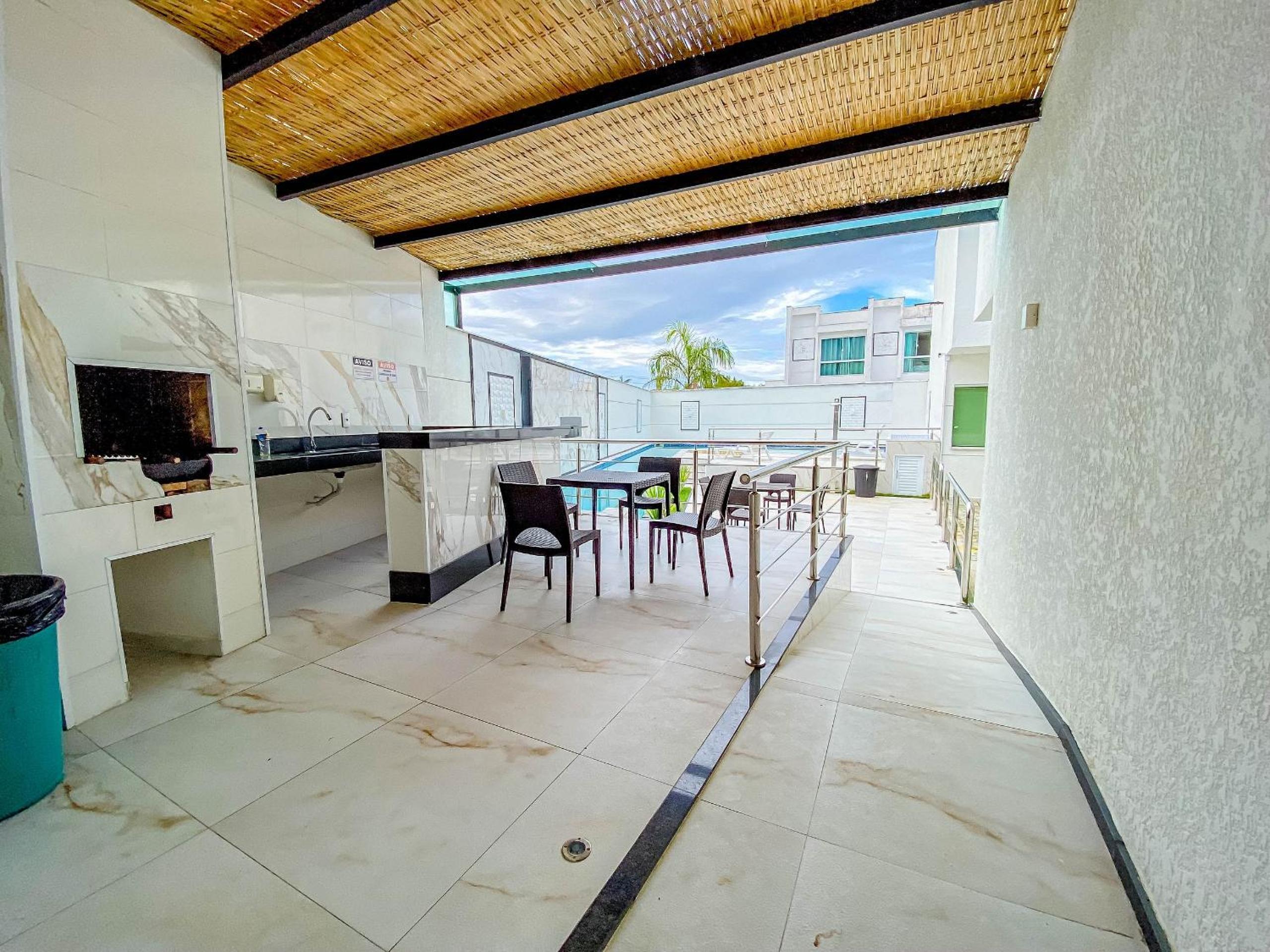 Casa com 4 quartos em condomínio com piscina e área gourmet próximo à praia de Taperapuã