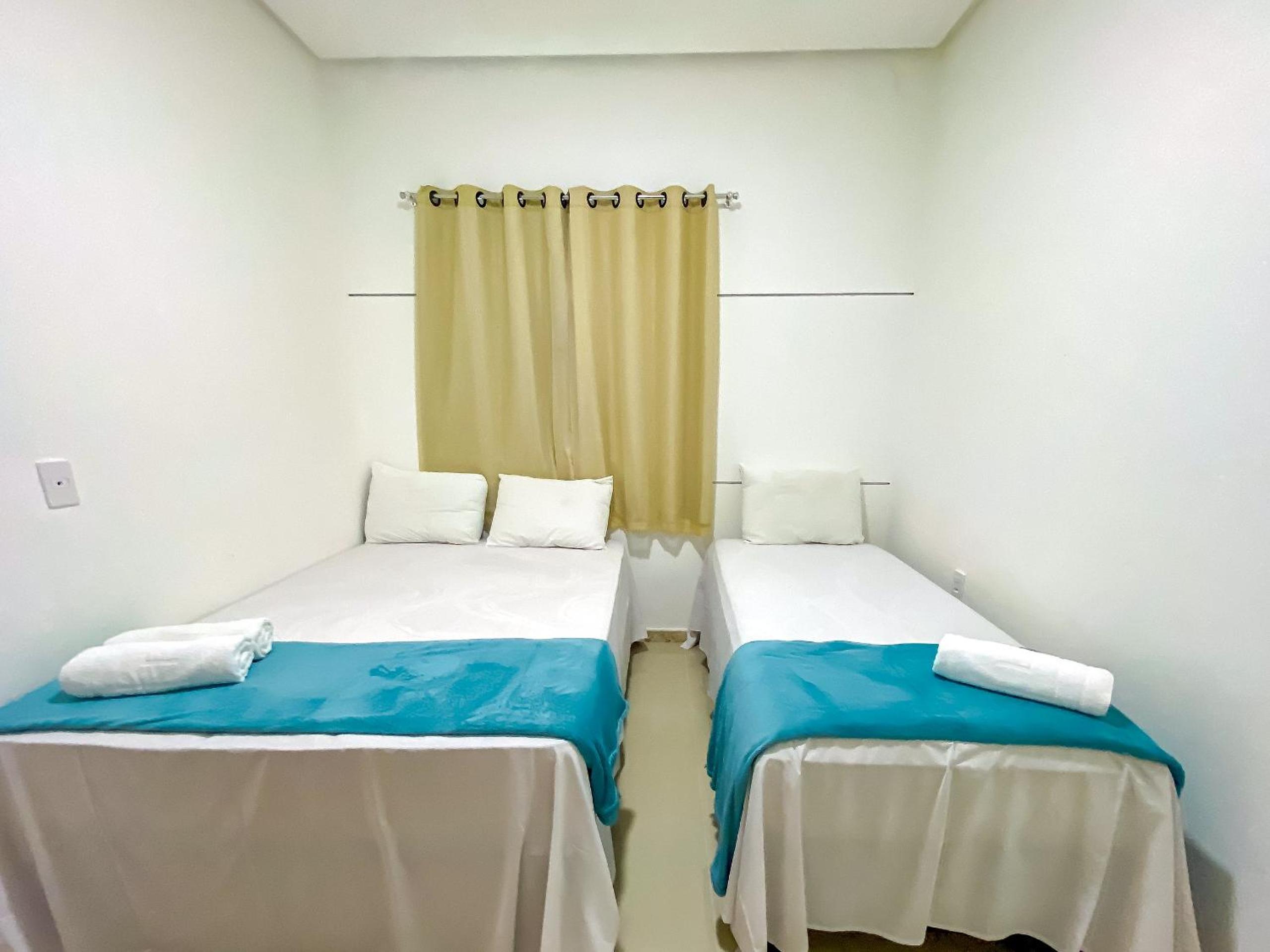 Casa com 4 quartos em condomínio com piscina e área gourmet próximo à praia de Taperapuã