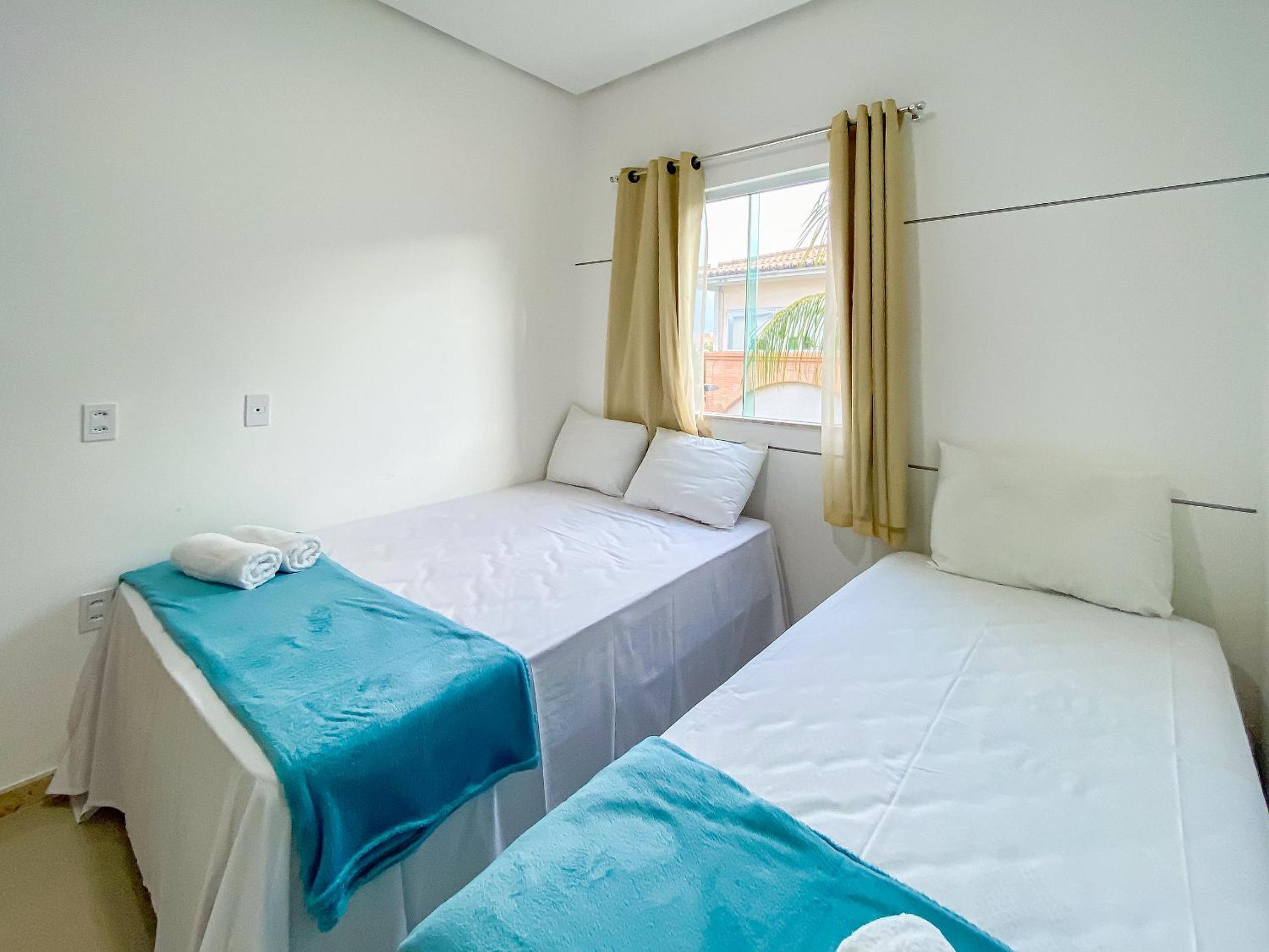 Casa com 4 quartos em condomínio com piscina e área gourmet próximo à praia de Taperapuã