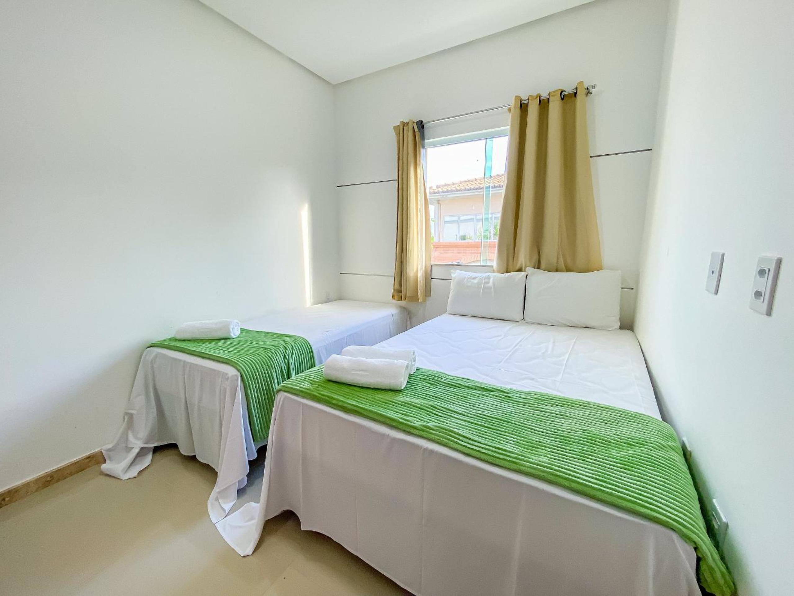 Casa com 4 quartos em condomínio com piscina e área gourmet próximo à praia de Taperapuã