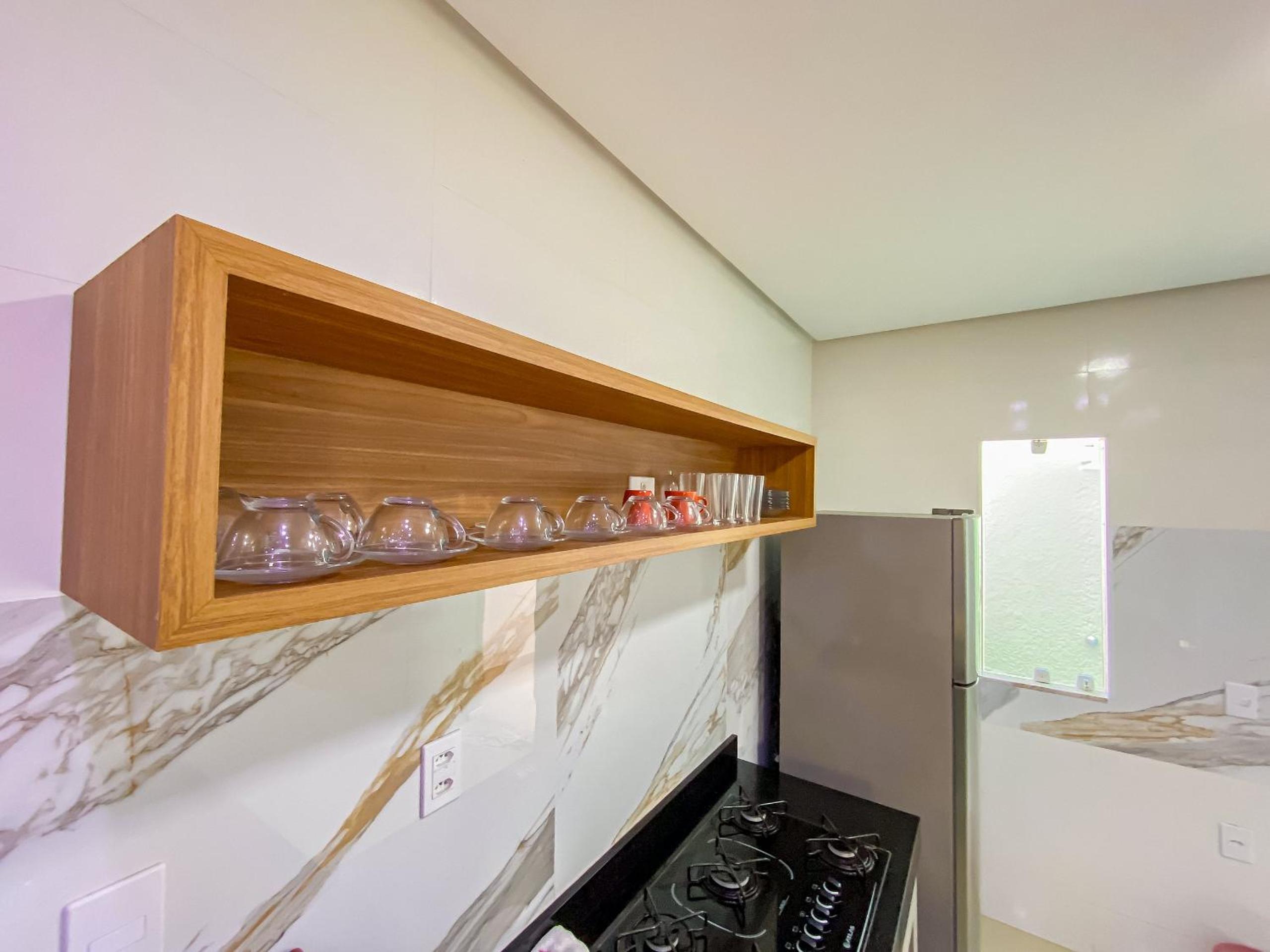 Casa com 4 quartos em condomínio com piscina e área gourmet próximo à praia de Taperapuã