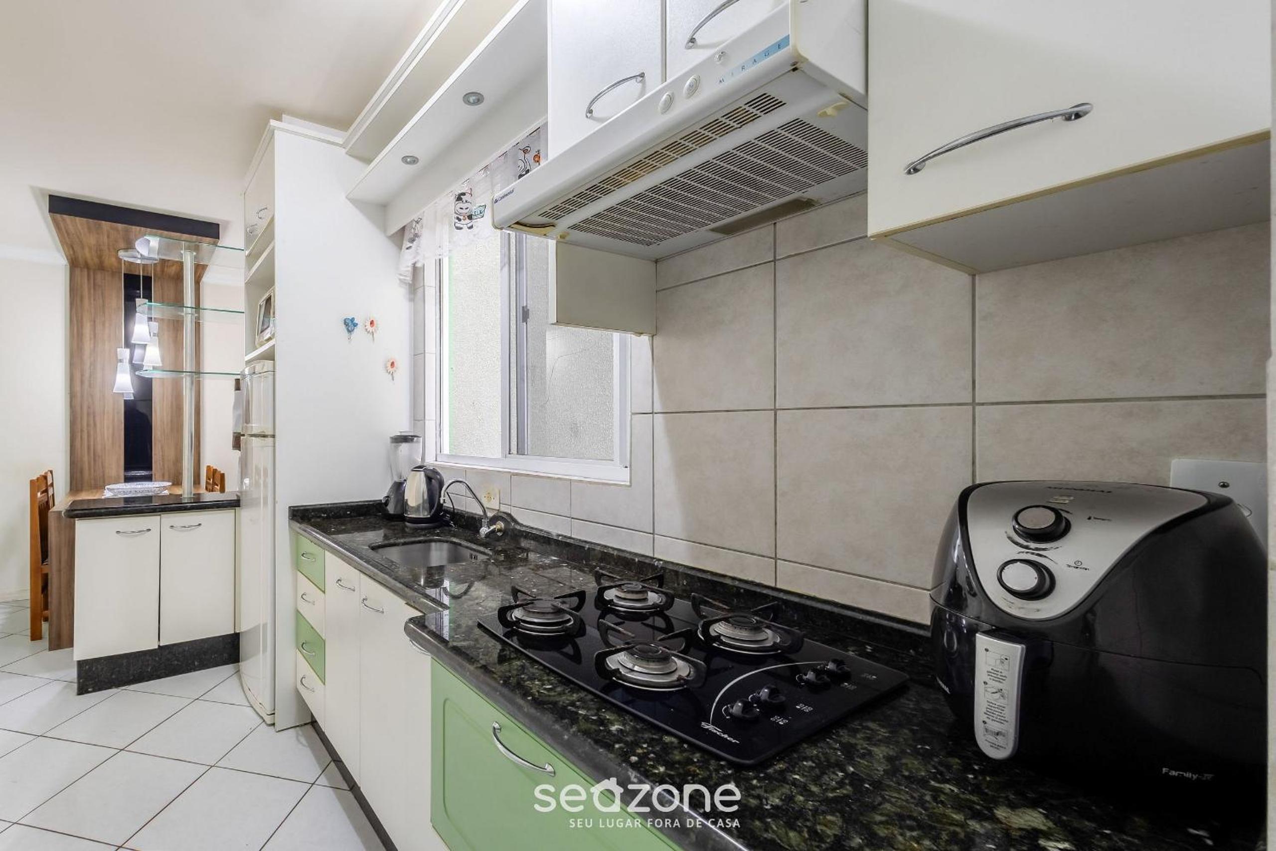 Fully equipped apartments steps from the sea in Meia Praia – OBS