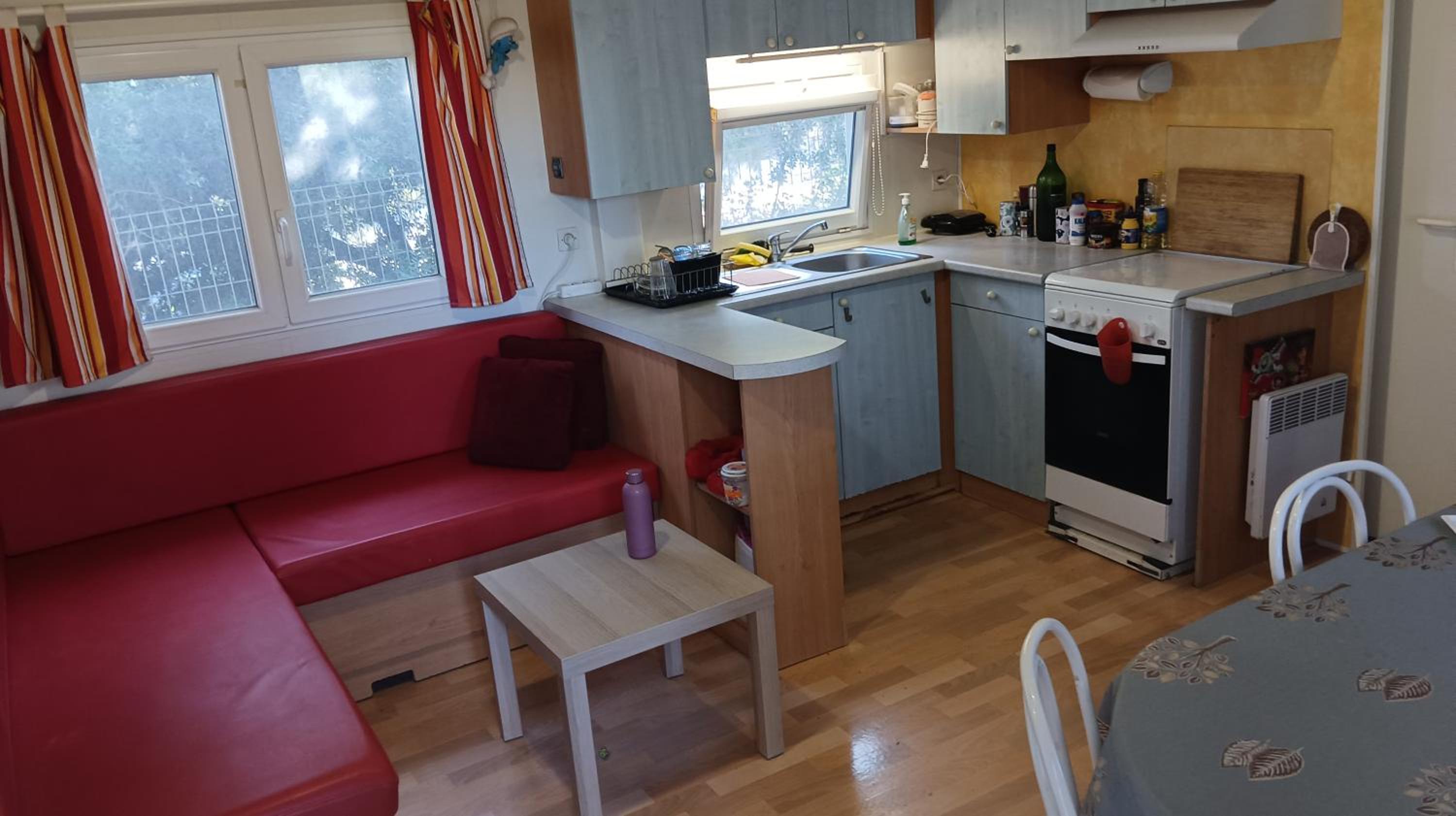 Family mobile home solar powered near the sea and the airport