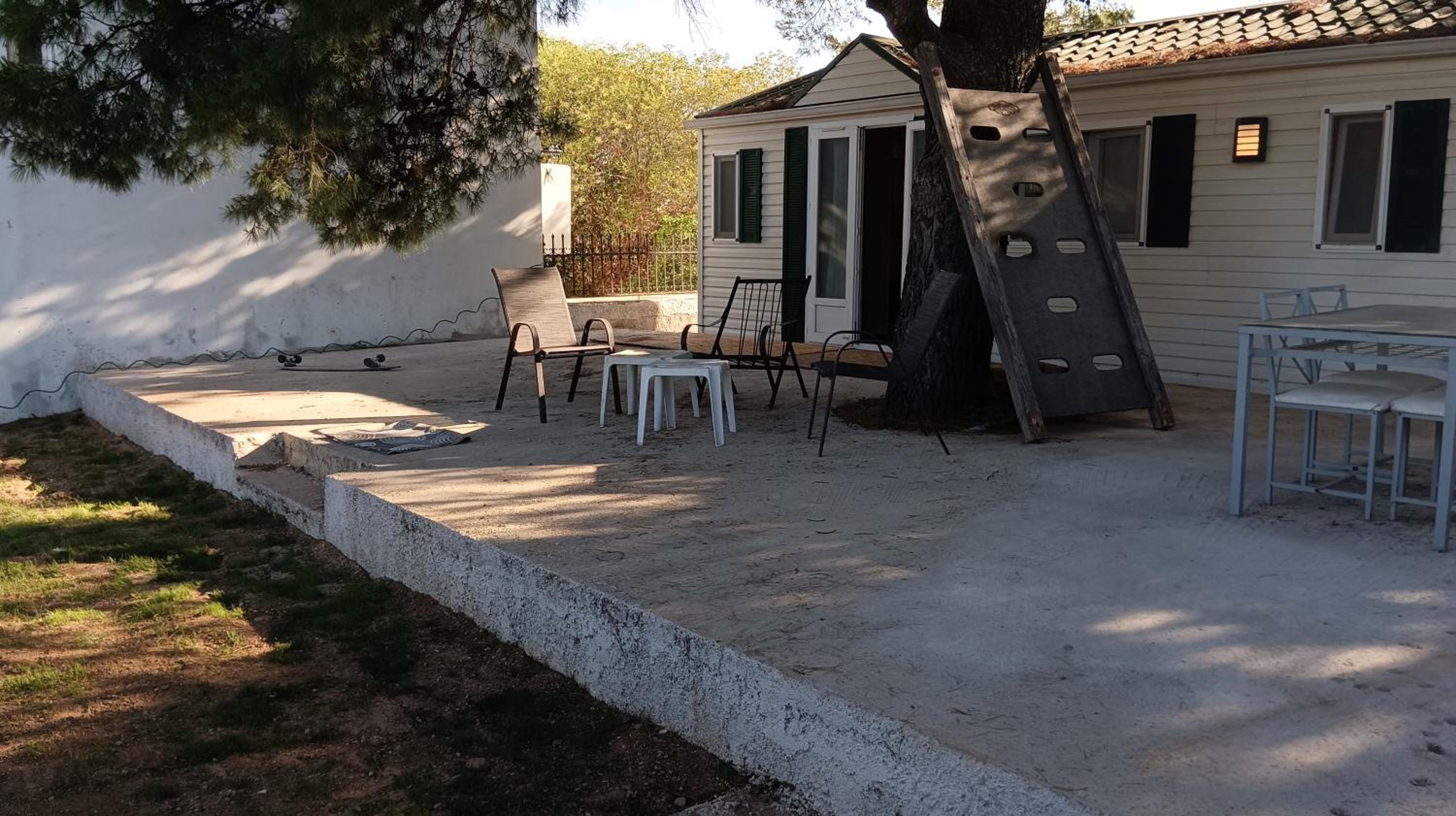 Family mobile home solar powered near the sea and the airport