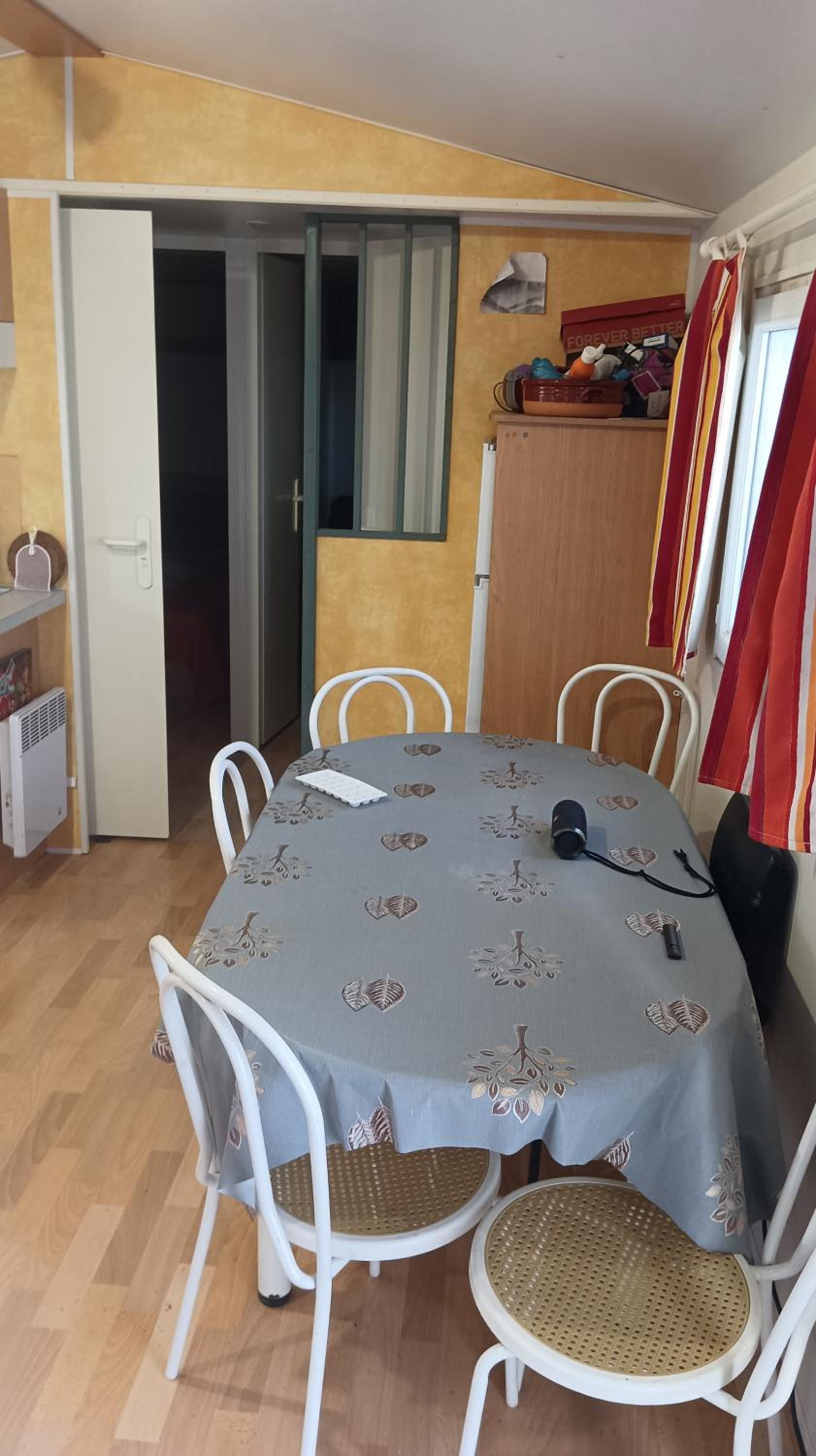 Family mobile home solar powered near the sea and the airport