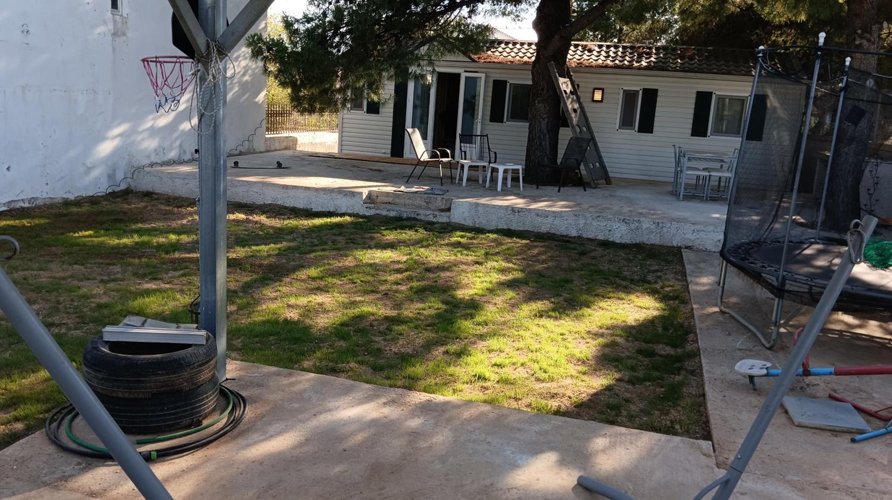 Family mobile home solar powered near the sea and the airport