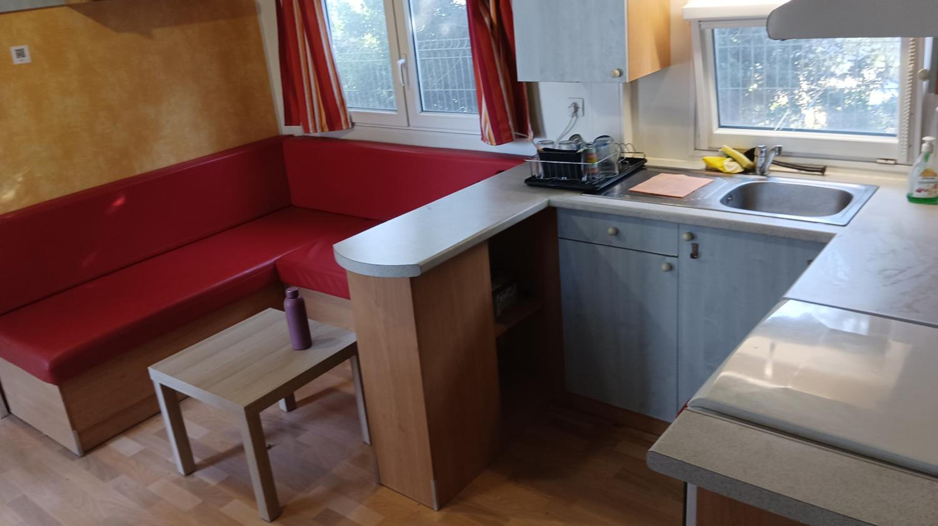 Family mobile home solar powered near the sea and the airport