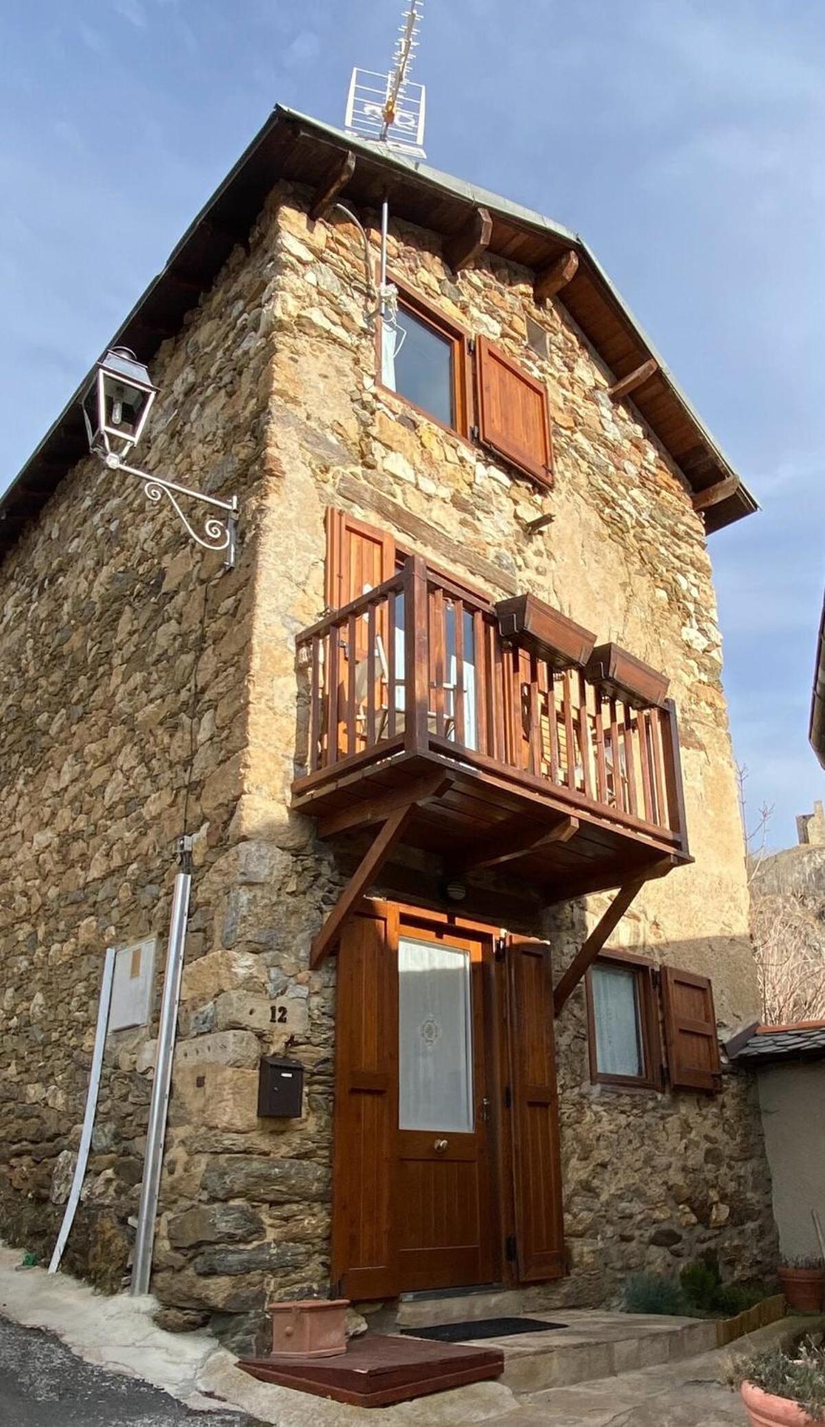 Cal Gano, 3-Story Stone & Wood Mountain Retreat