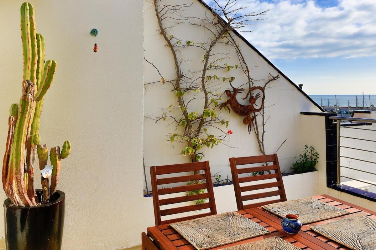 Stunning sea views over marina with swimming pool