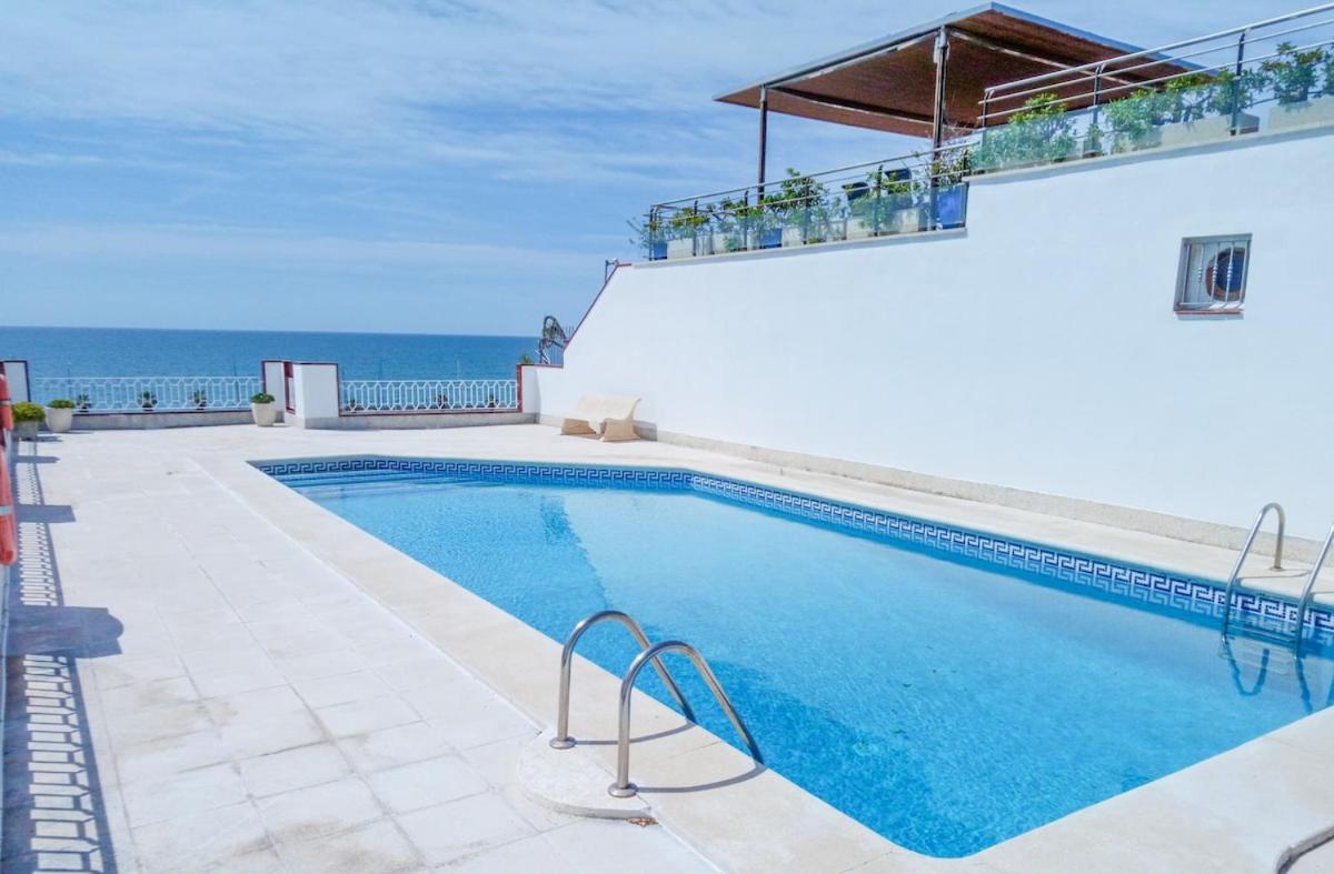 Stunning sea views over marina with swimming pool
