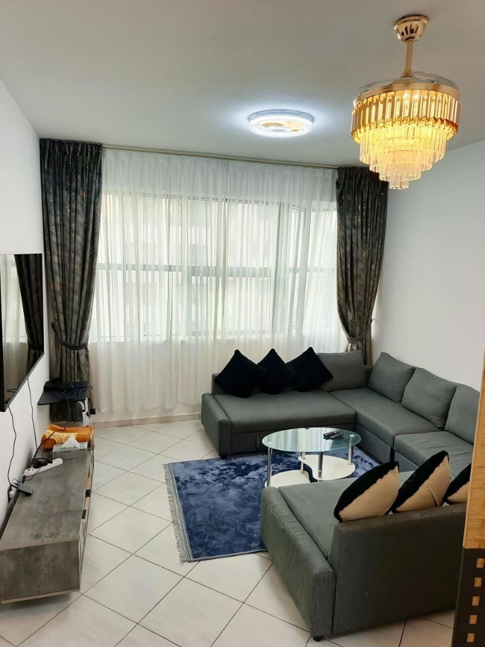 Ajman Family Holiday homes VIP Two rooms, a large hall and a fully equipped kitchen that can accommodate 7 people and children