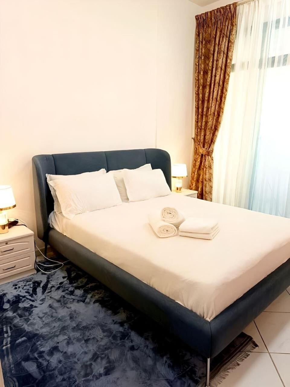 Ajman Family Holiday homes VIP Two rooms, a large hall and a fully equipped kitchen that can accommodate 7 people and children
