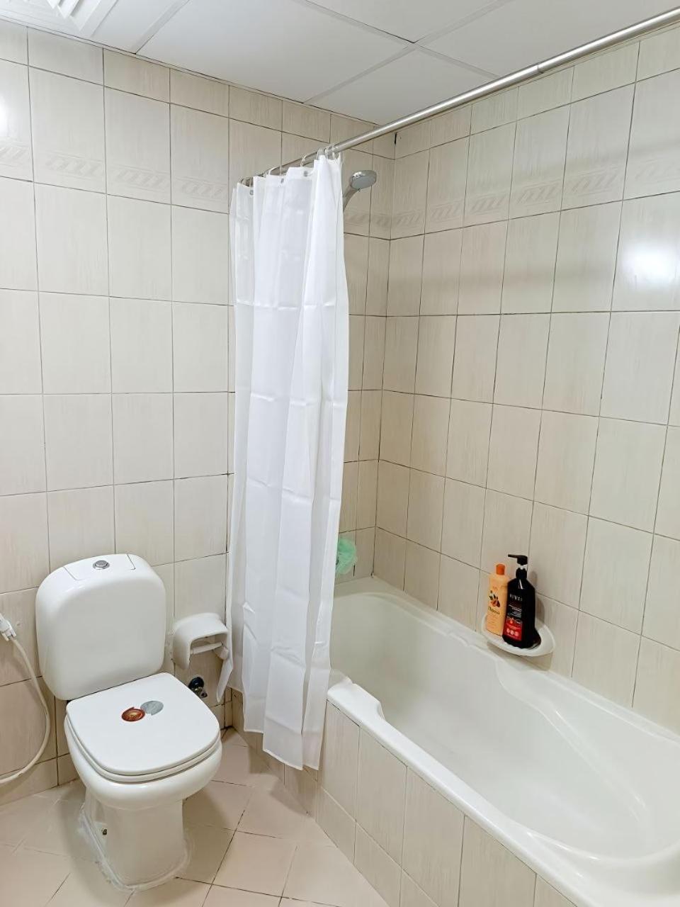 Ajman Family Holiday homes VIP Two rooms, a large hall and a fully equipped kitchen that can accommodate 7 people and children
