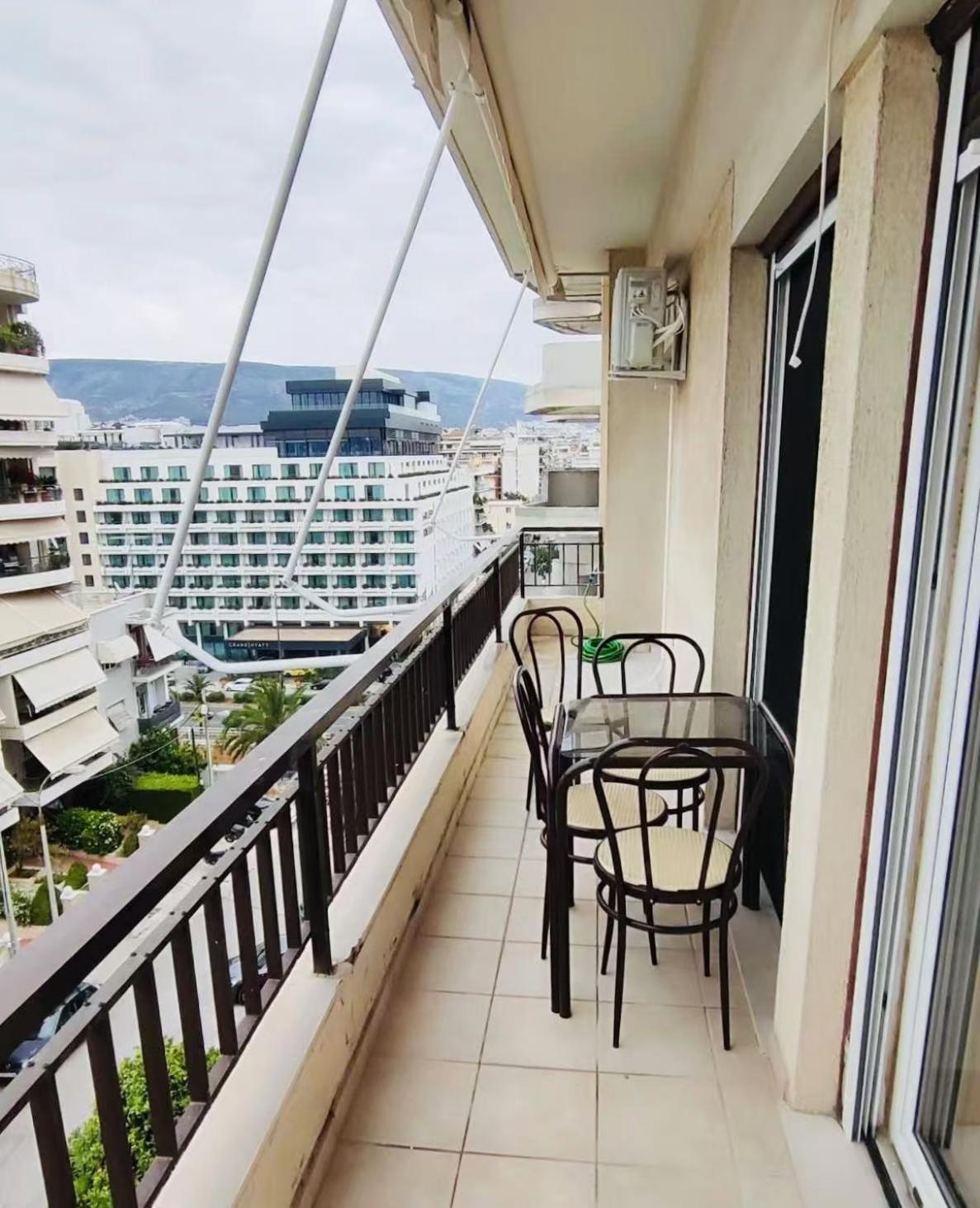 Center Athens all new and fully equipped 2 bedrooms 82 sqm big sea view apt close to Acropoli with Lift