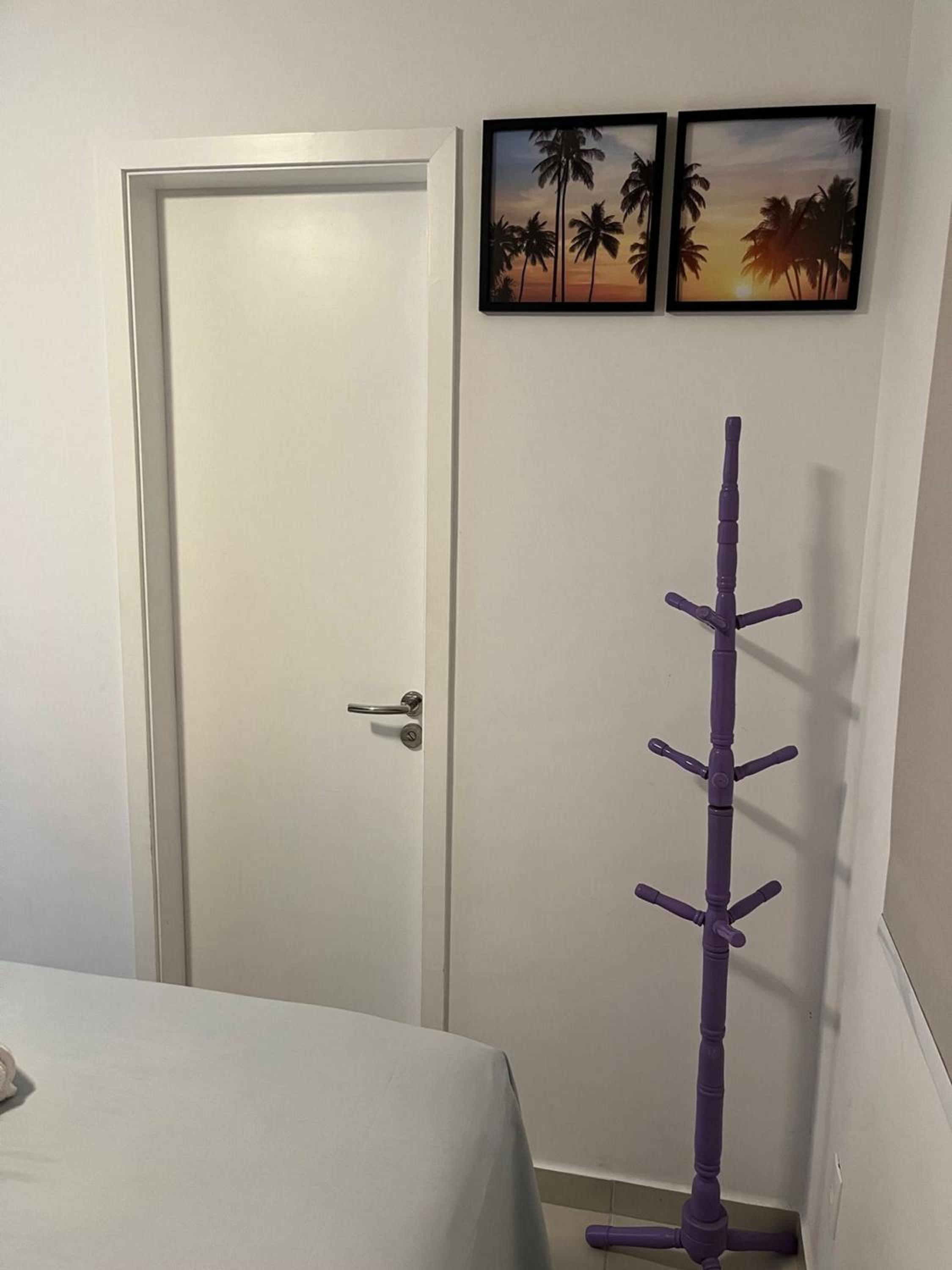 Home 12| Ap piscina aquecida pé na areia Bertioga