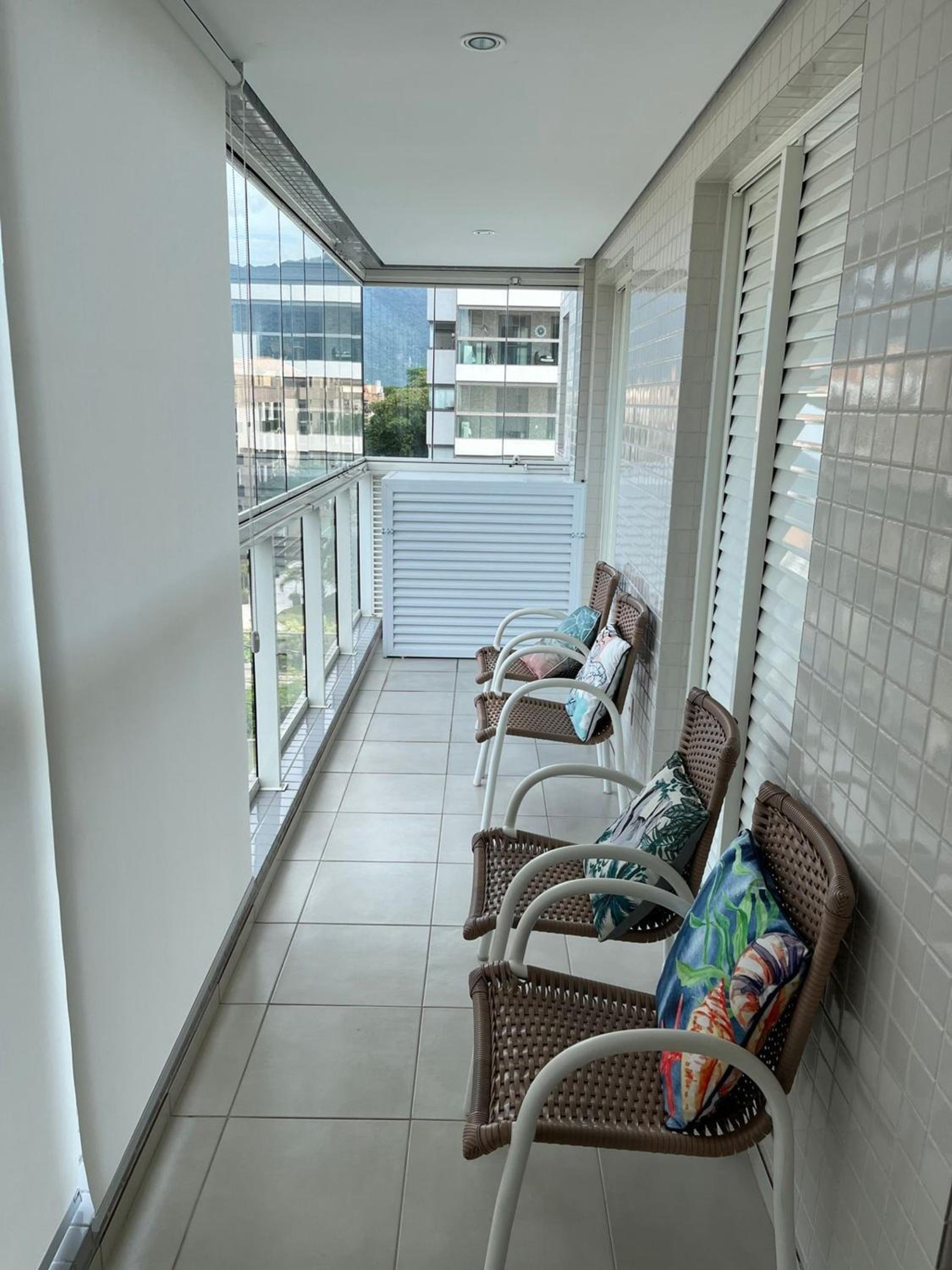 Home 12| Ap piscina aquecida pé na areia Bertioga