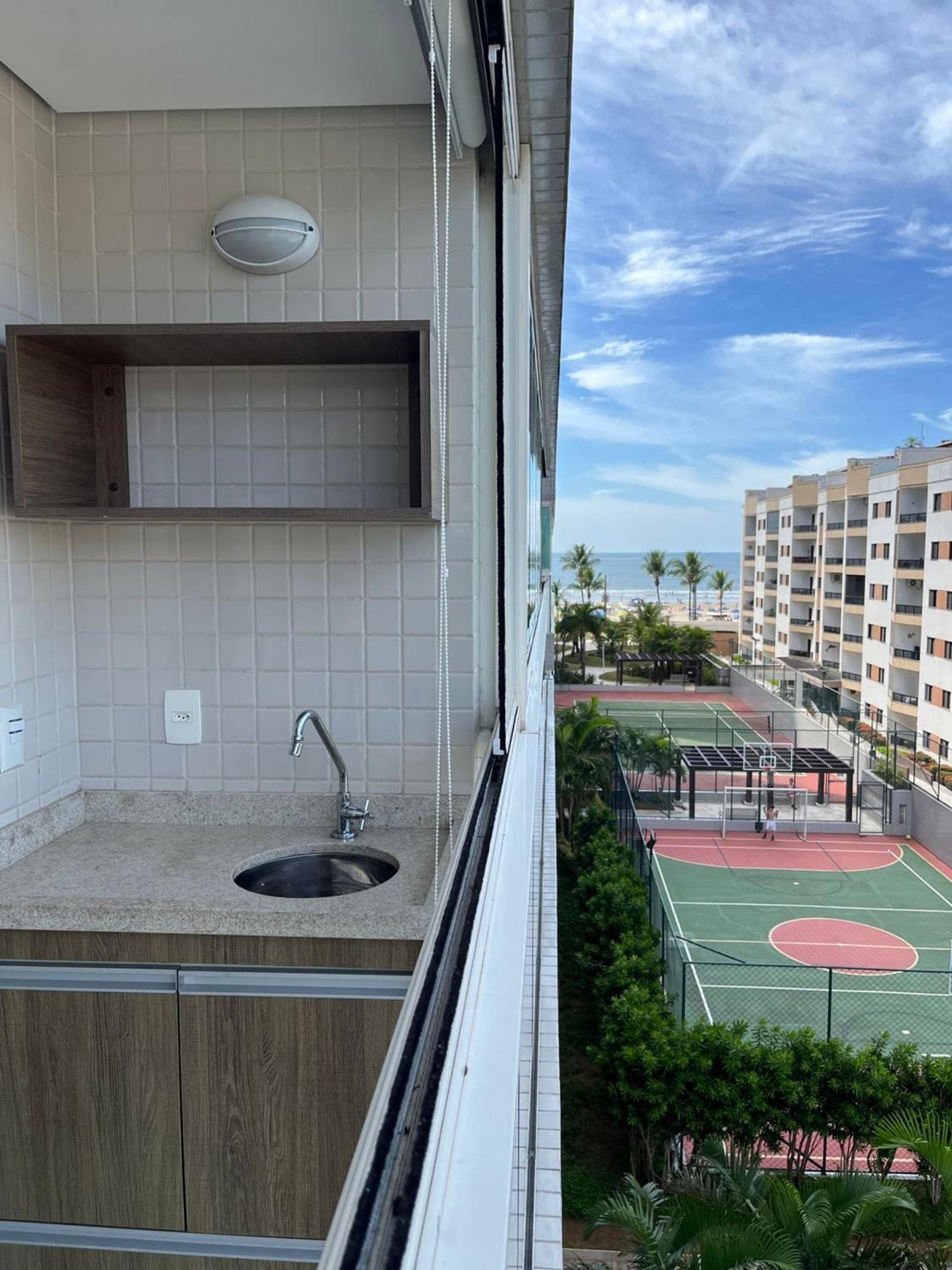 Home 12| Ap piscina aquecida pé na areia Bertioga