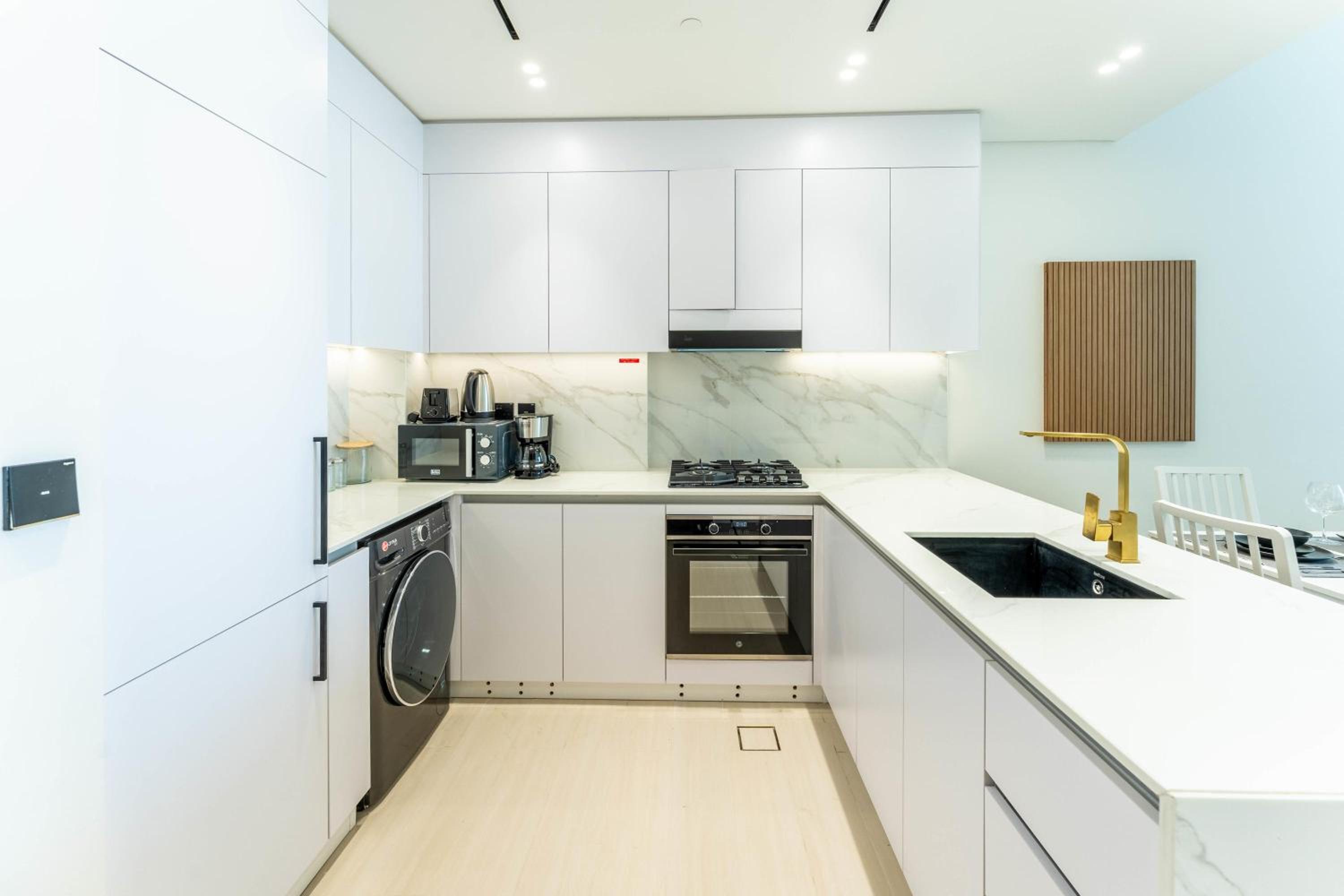 FAM Living Minimalist 1BR Gem in Binghatti Amber