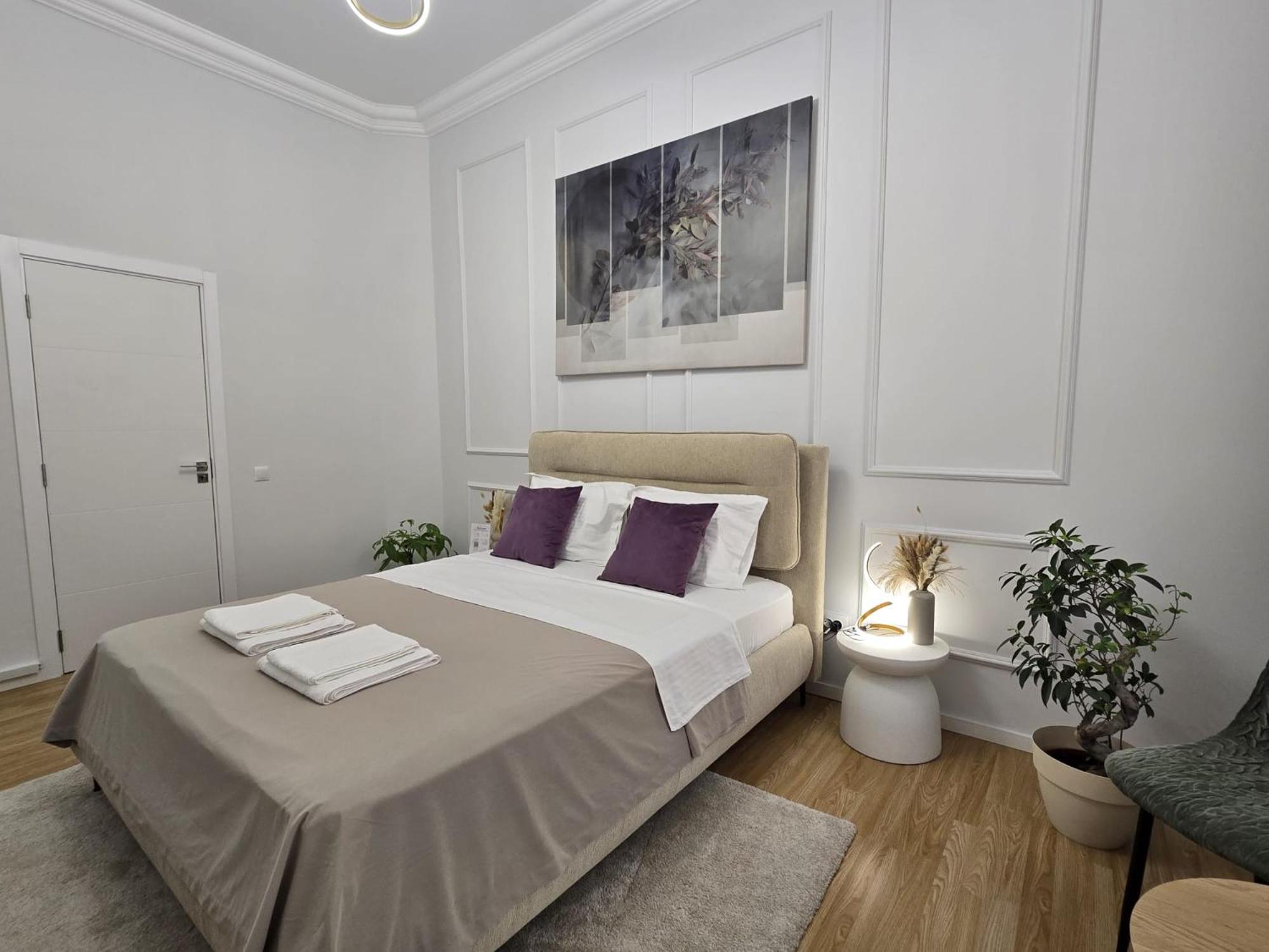 Central Luxury Apartments with Private Garden & Parking