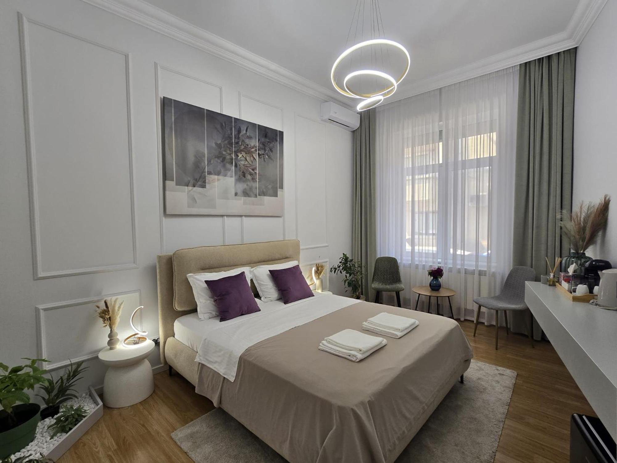 Central Luxury Apartments with Private Garden & Parking