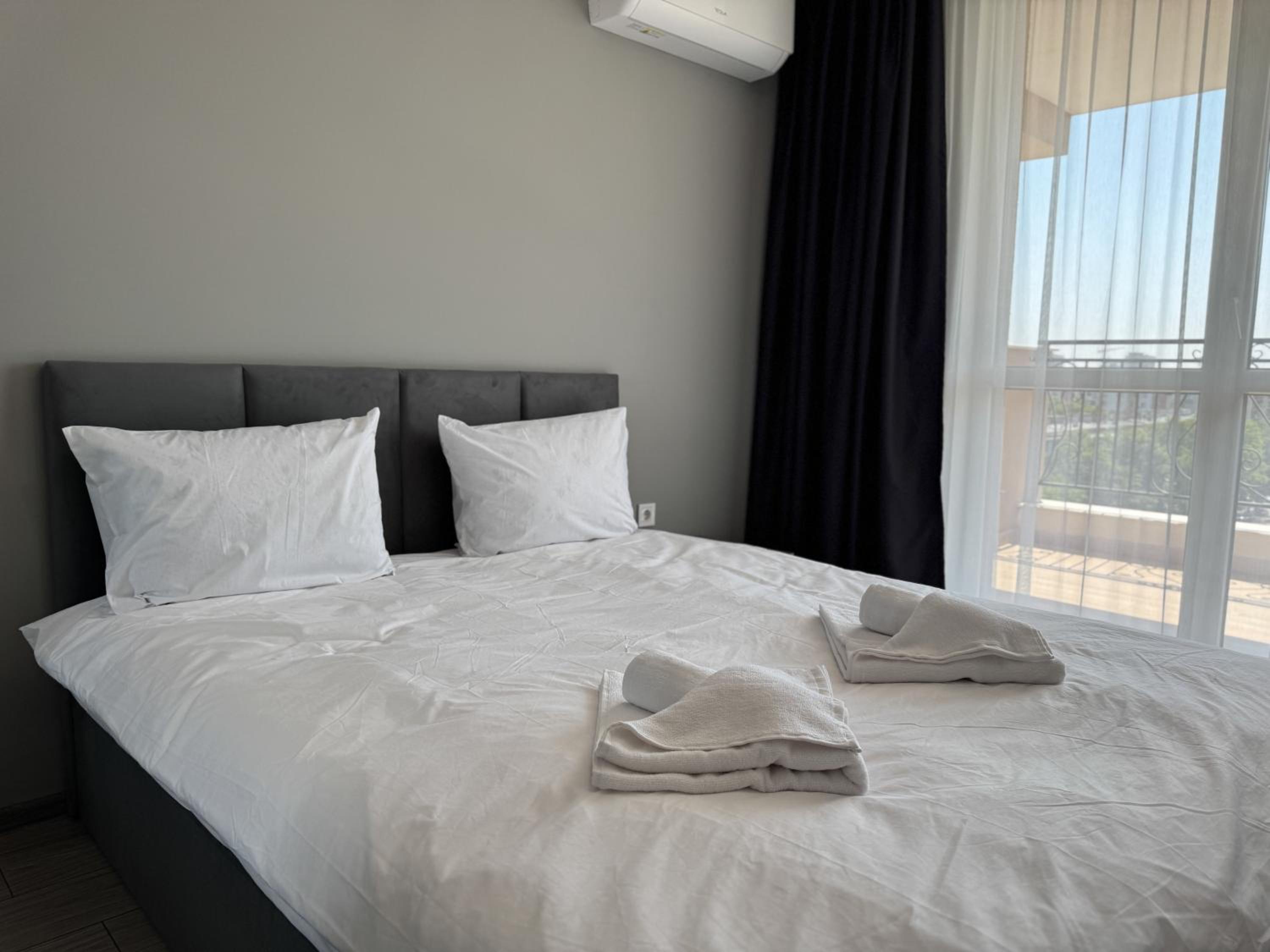 1BR Apartment with Panoramic View Balcony and Designated Parking Space