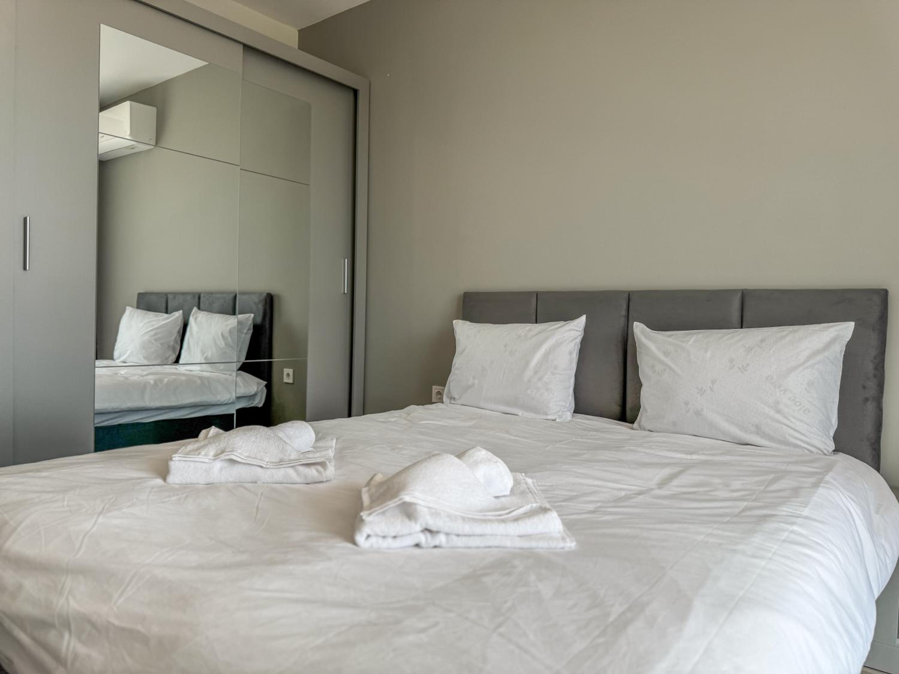 1BR Apartment with Panoramic View Balcony and Designated Parking Space