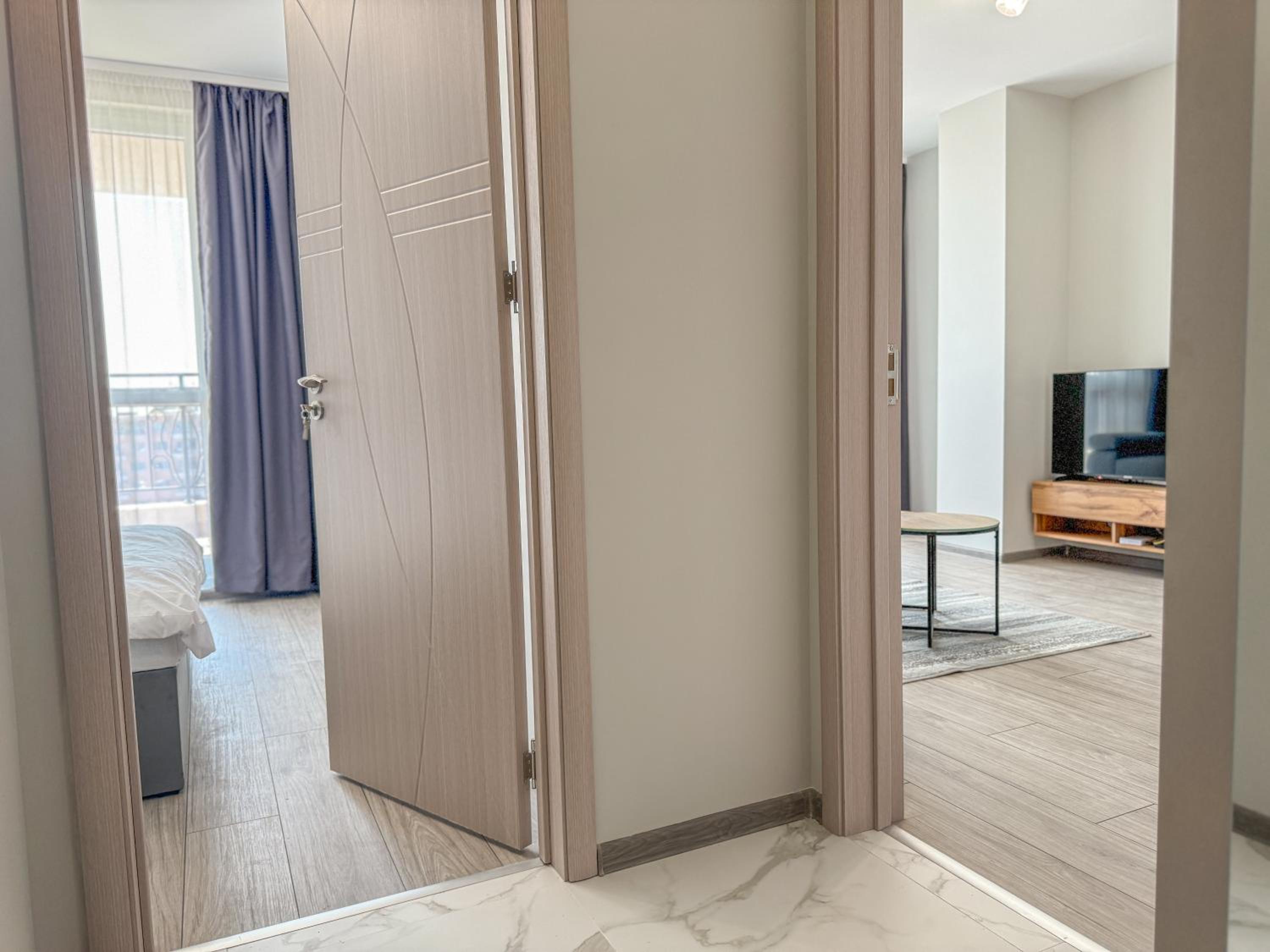 1BR Apartment with Panoramic View Balcony and Designated Parking Space