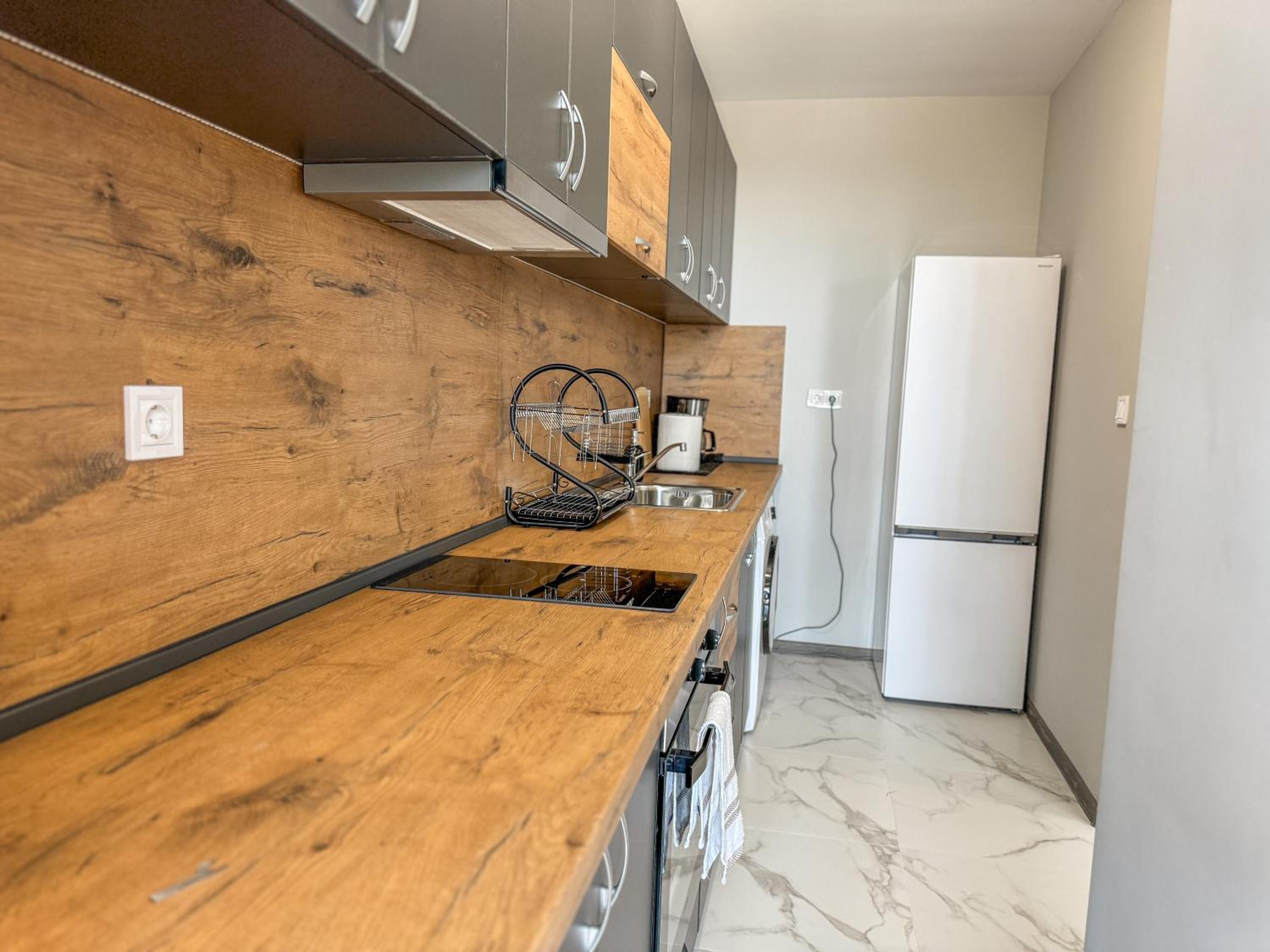 1BR Apartment with Panoramic View Balcony and Designated Parking Space