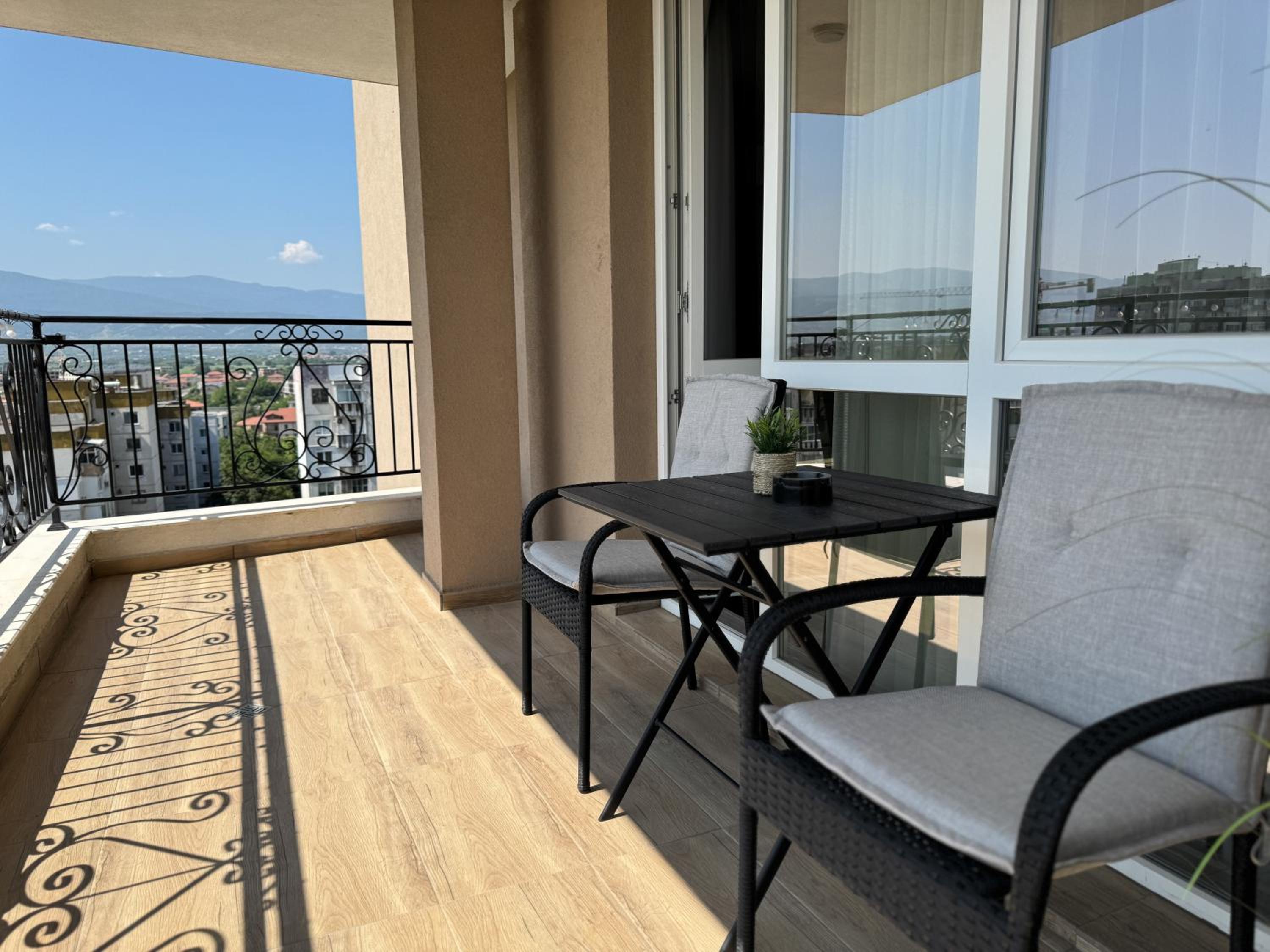 1BR Apartment with Panoramic View Balcony and Designated Parking Space