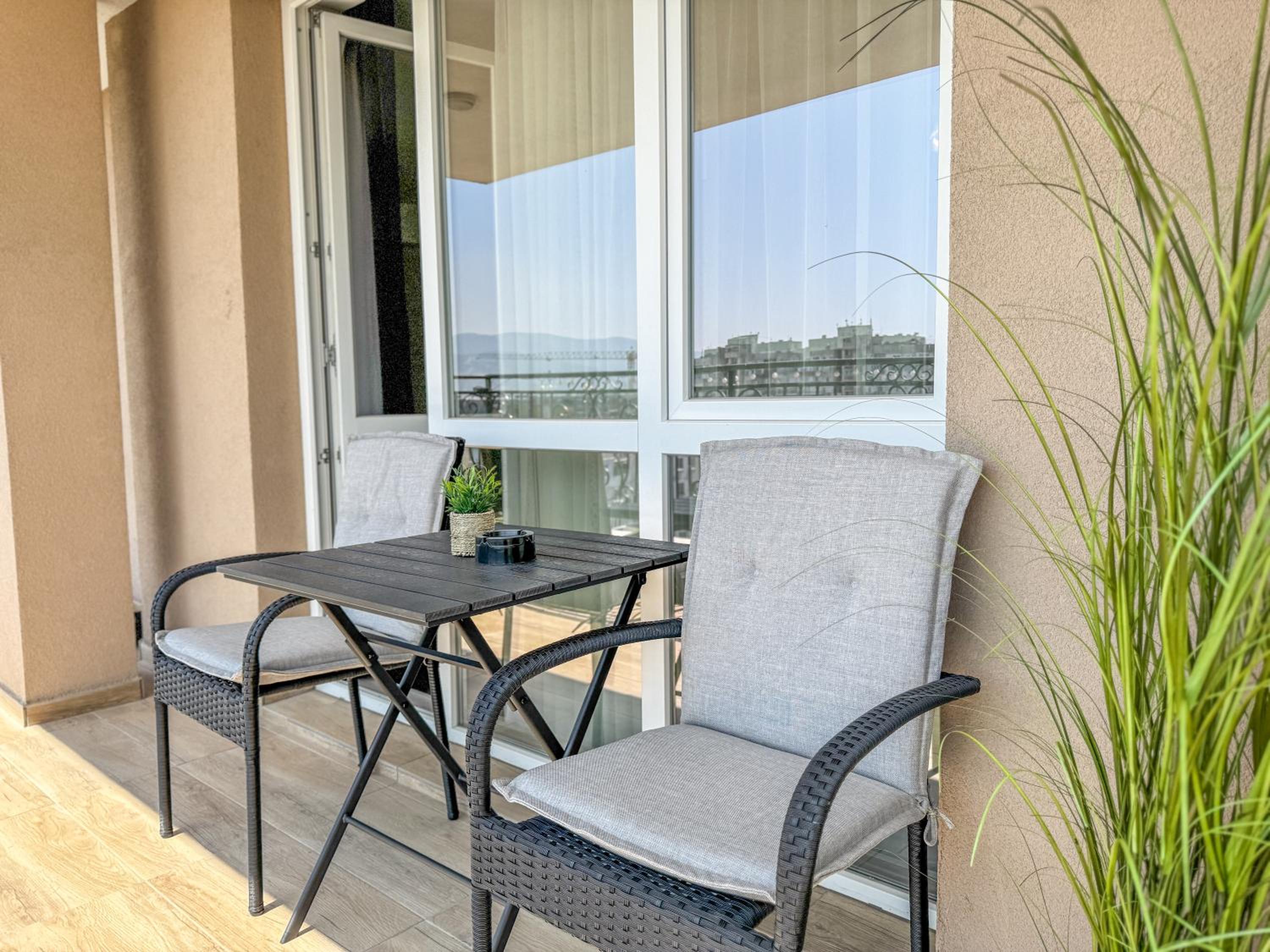 1BR Apartment with Panoramic View Balcony and Designated Parking Space