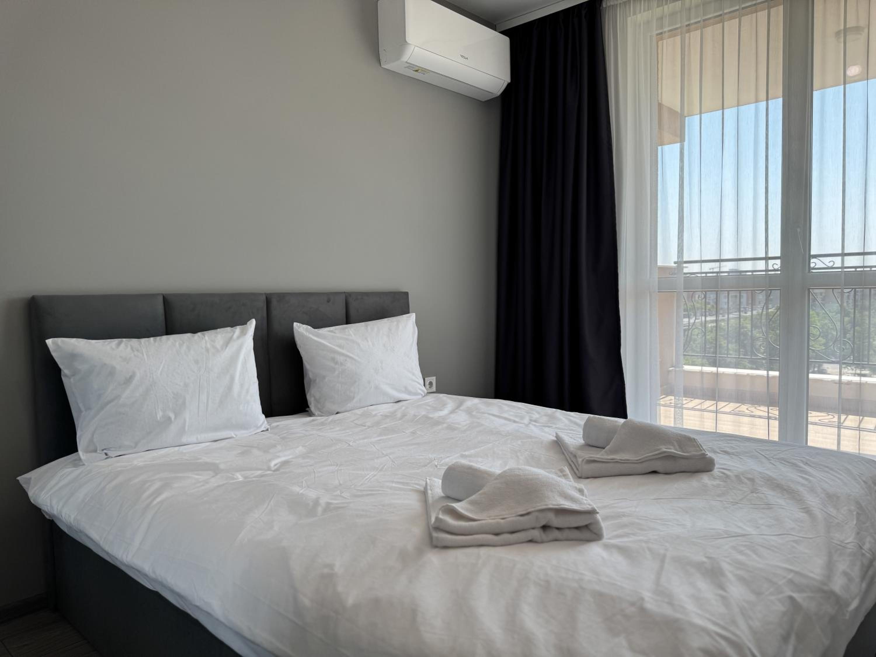 1BR Apartment with Panoramic View Balcony and Designated Parking Space