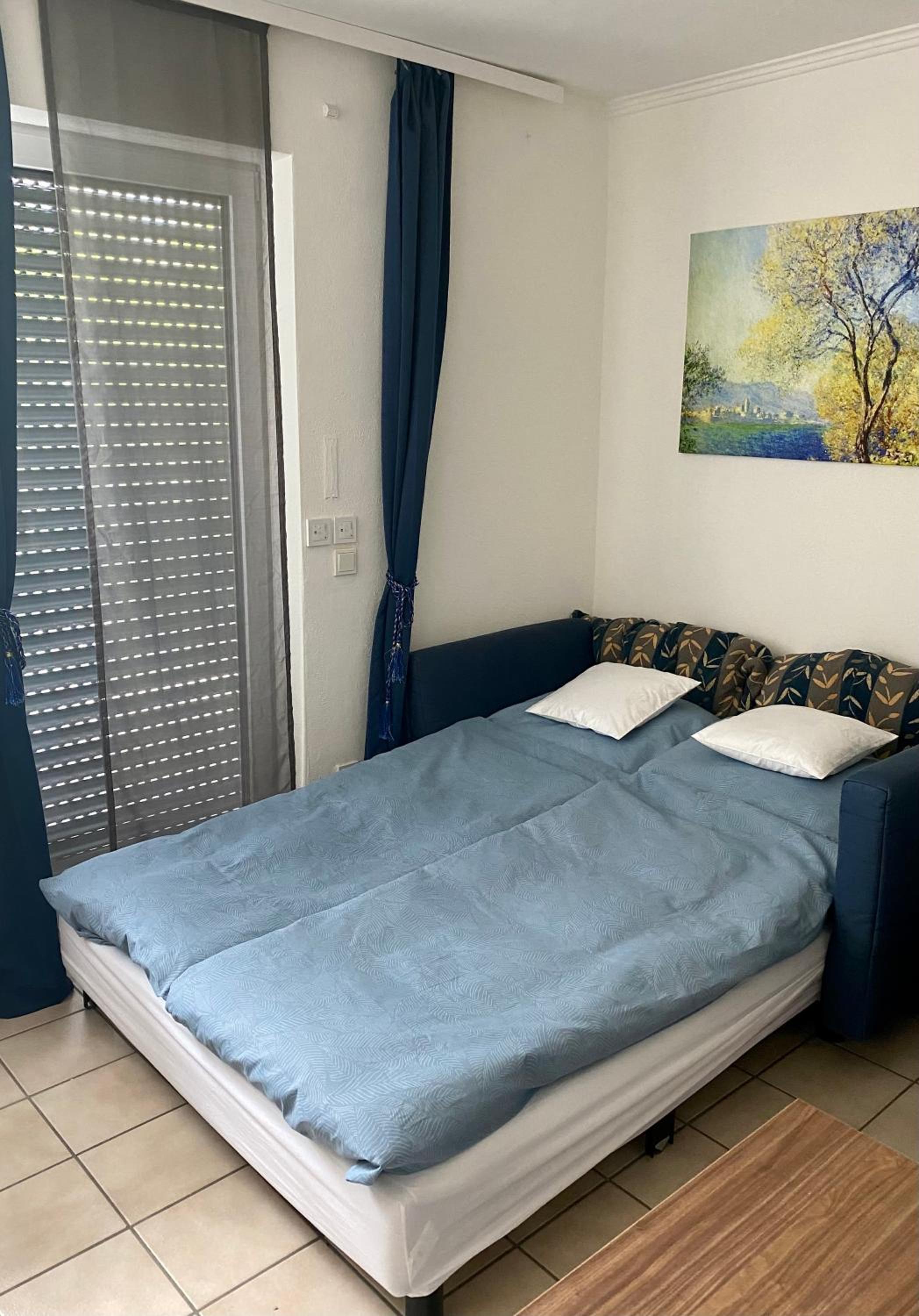 Gemütliche und voll ausgestatette 2 Zimmer Ferienwohnung am Wörthsee mit Terrasse, Grill, Schaukel, Doppelbett oder getrennte Betten fußläufig zu S-Bahn na