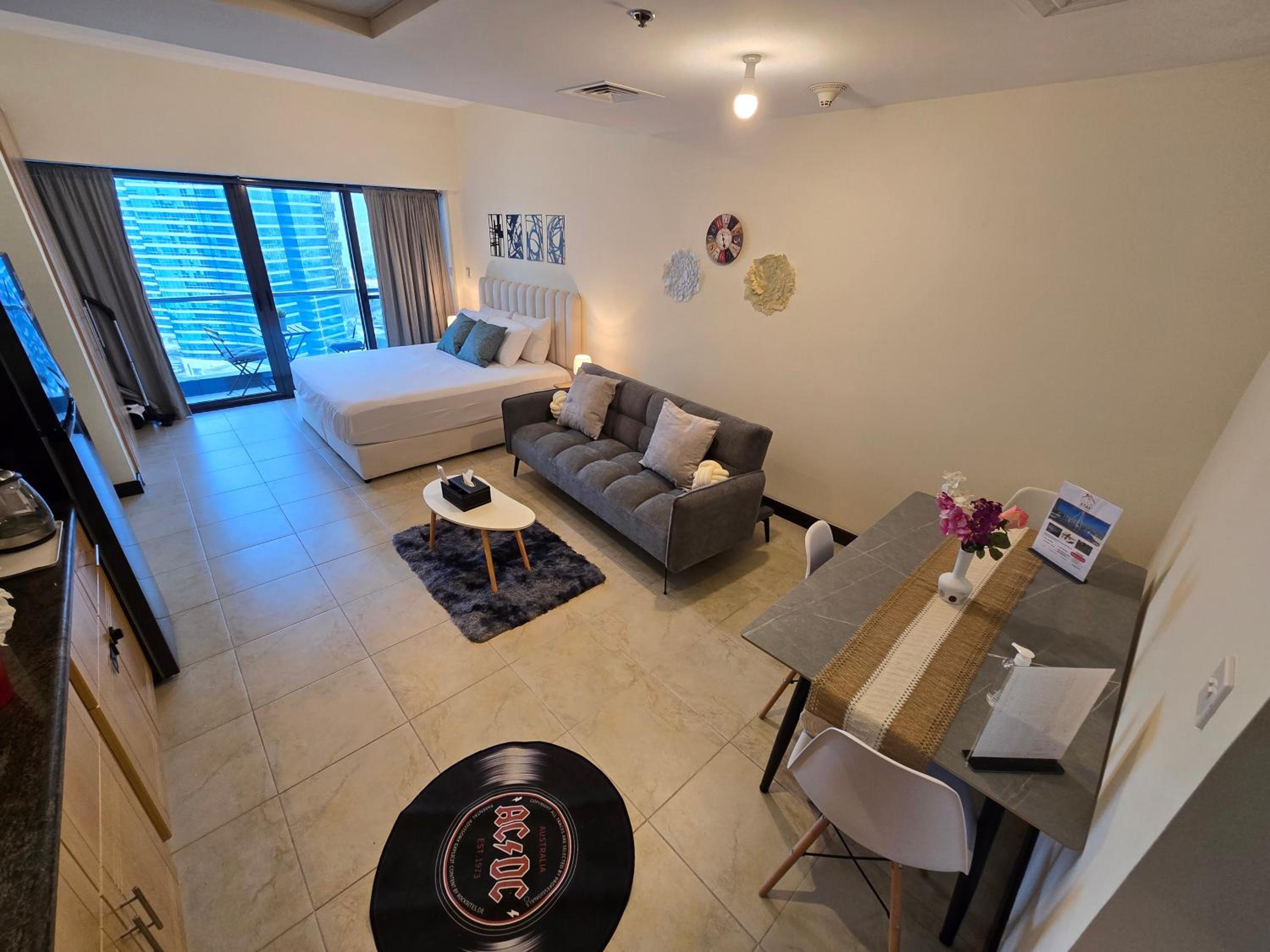 Click Stay - JLT - Entire Studio & Balcony Lakes view Apartment -NA