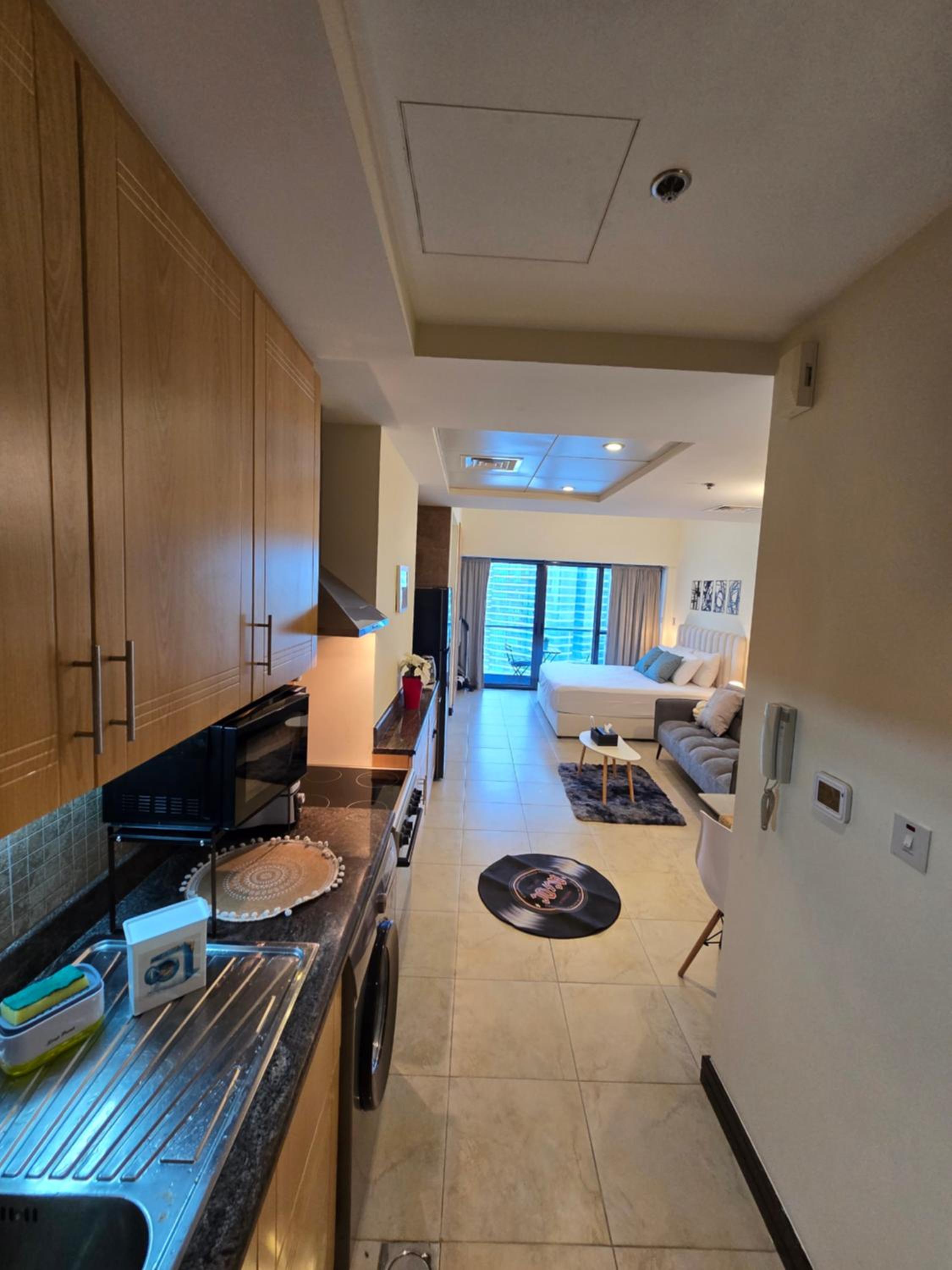 Click Stay - JLT - Entire Studio & Balcony Lakes view Apartment -NA