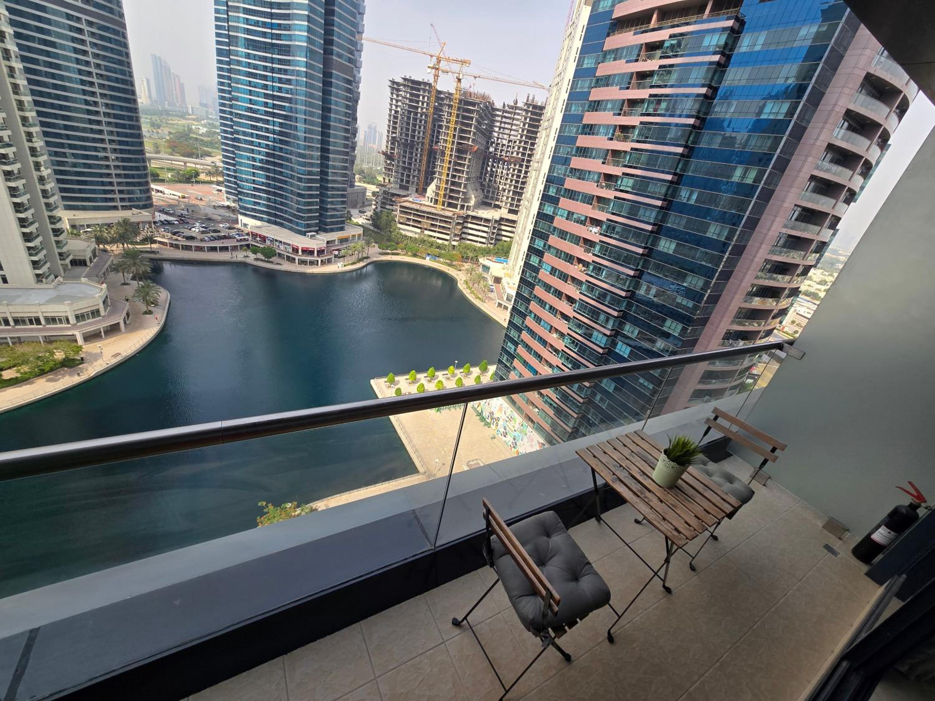 Click Stay - JLT - Entire Studio & Balcony Lakes view Apartment -NA