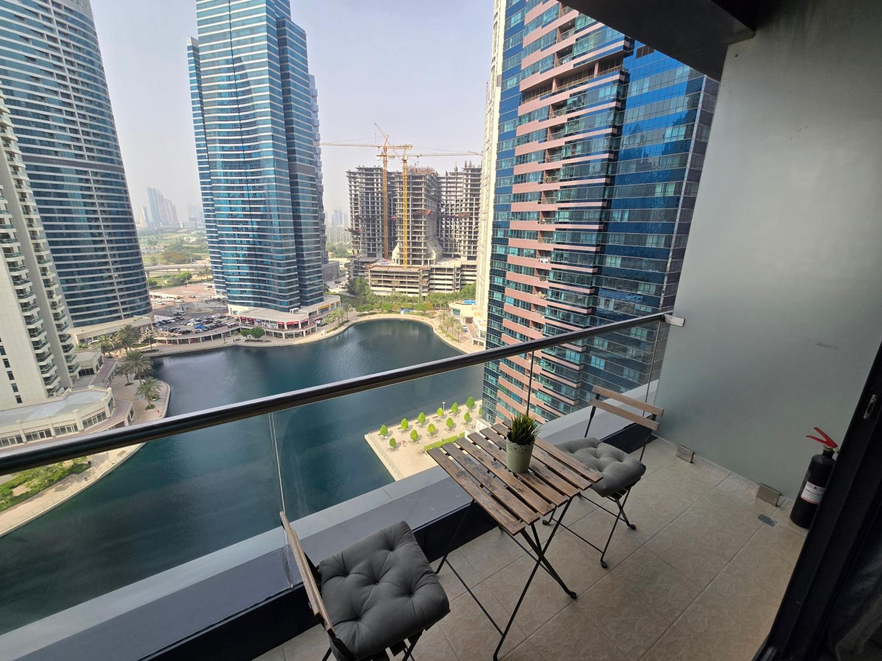 Click Stay - JLT - Entire Studio & Balcony Lakes view Apartment -NA