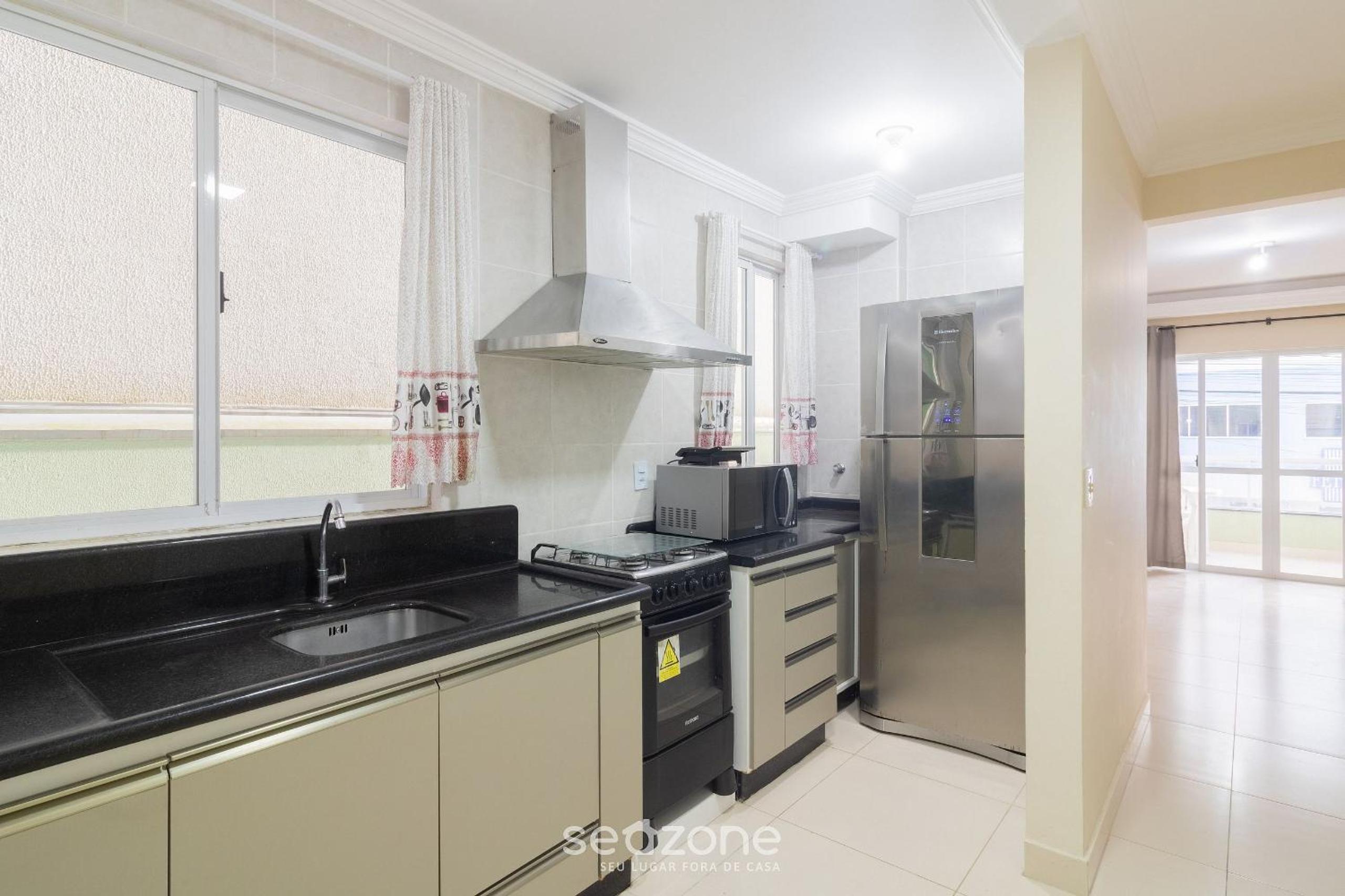 Fully equipped apartments steps from the sea in Meia Praia – OBS