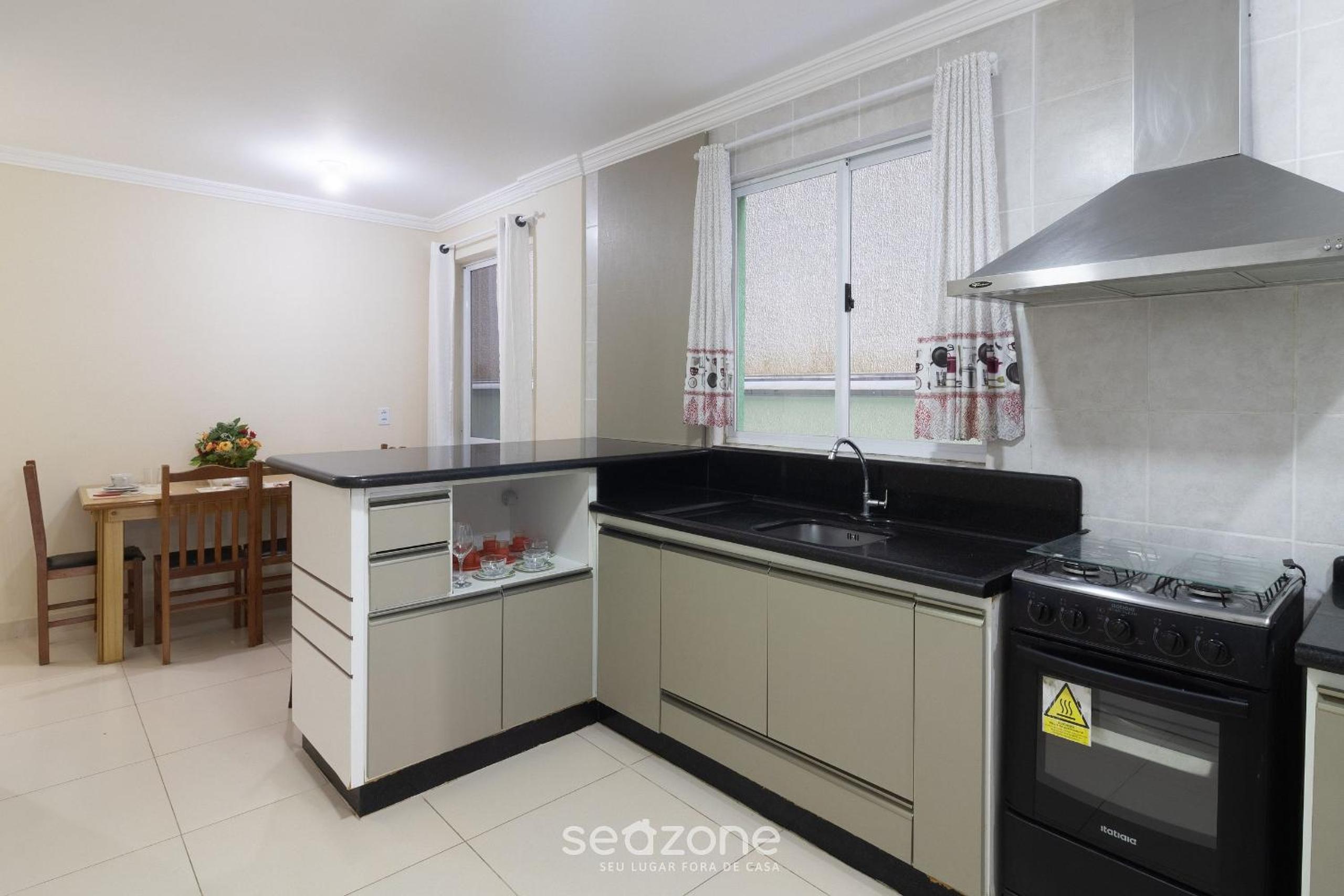 Fully equipped apartments steps from the sea in Meia Praia – OBS