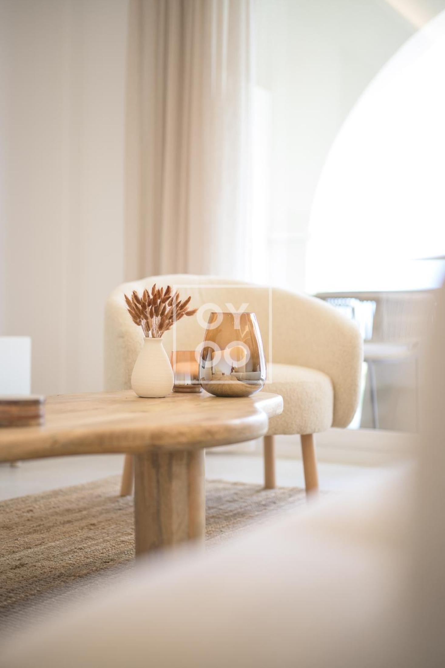 The Q Penthouse, apt with boho-chic rooftop, by OYOOSTAYS