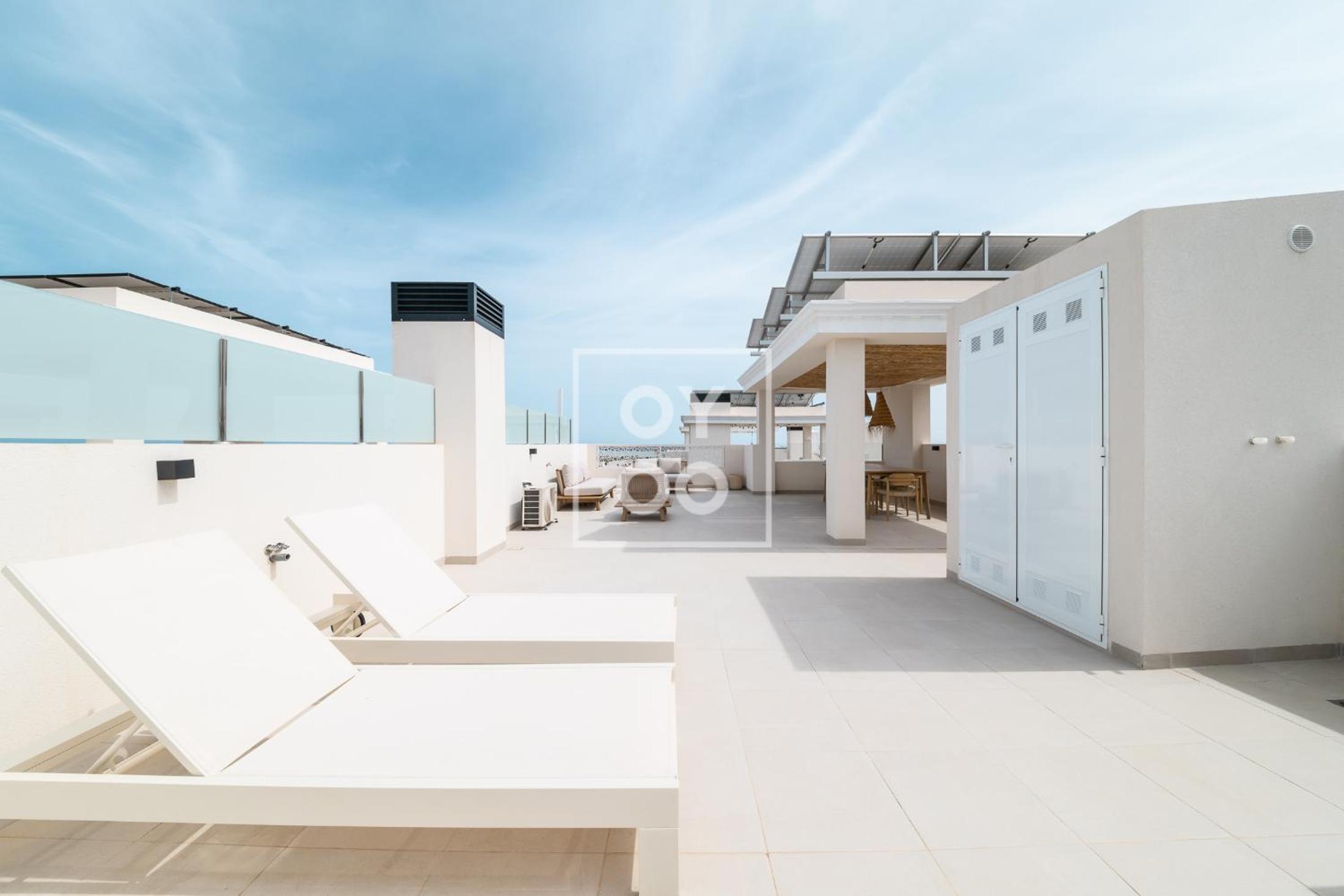 The Q Penthouse, apt with boho-chic rooftop, by OYOOSTAYS