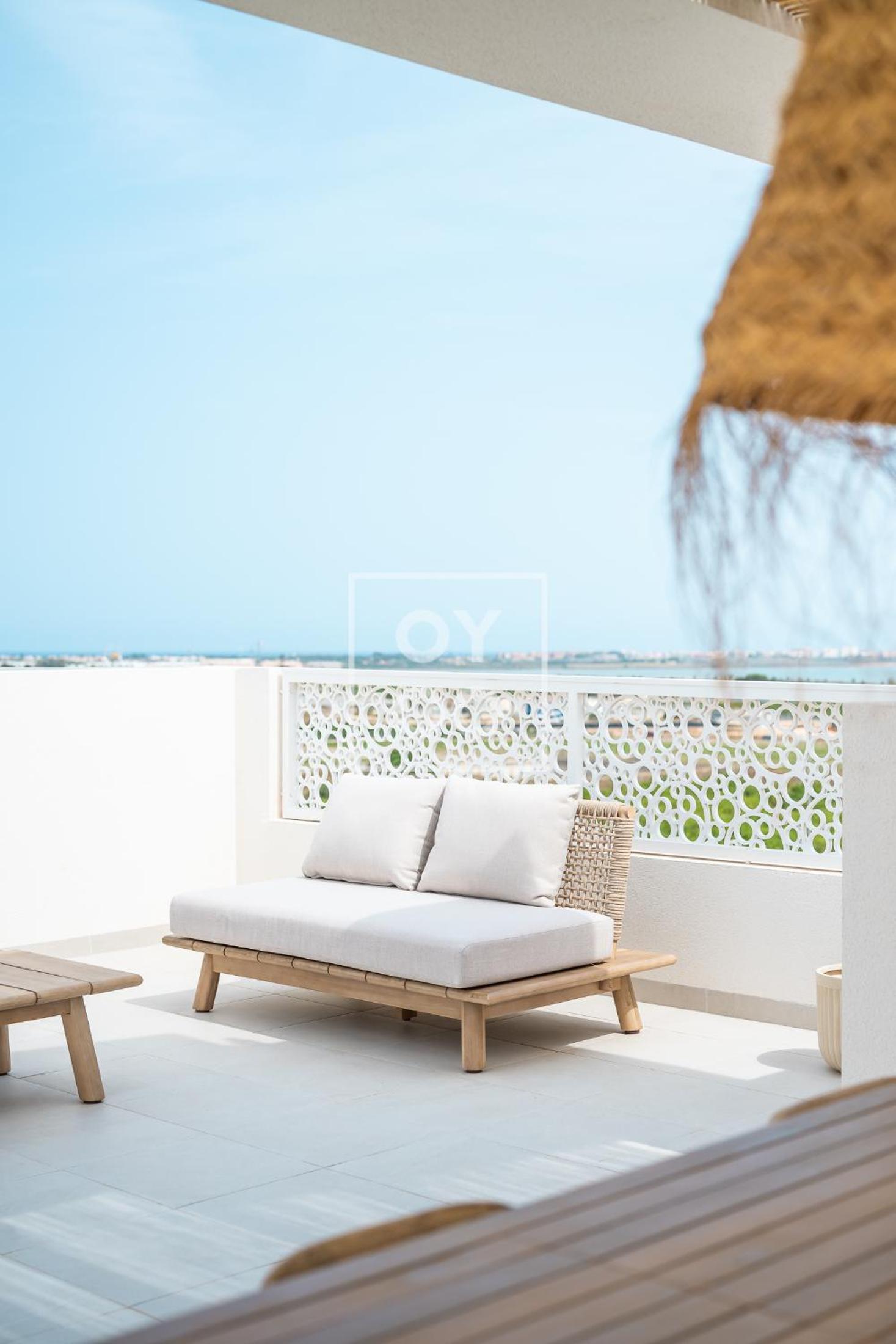 The Q Penthouse, apt with boho-chic rooftop, by OYOOSTAYS