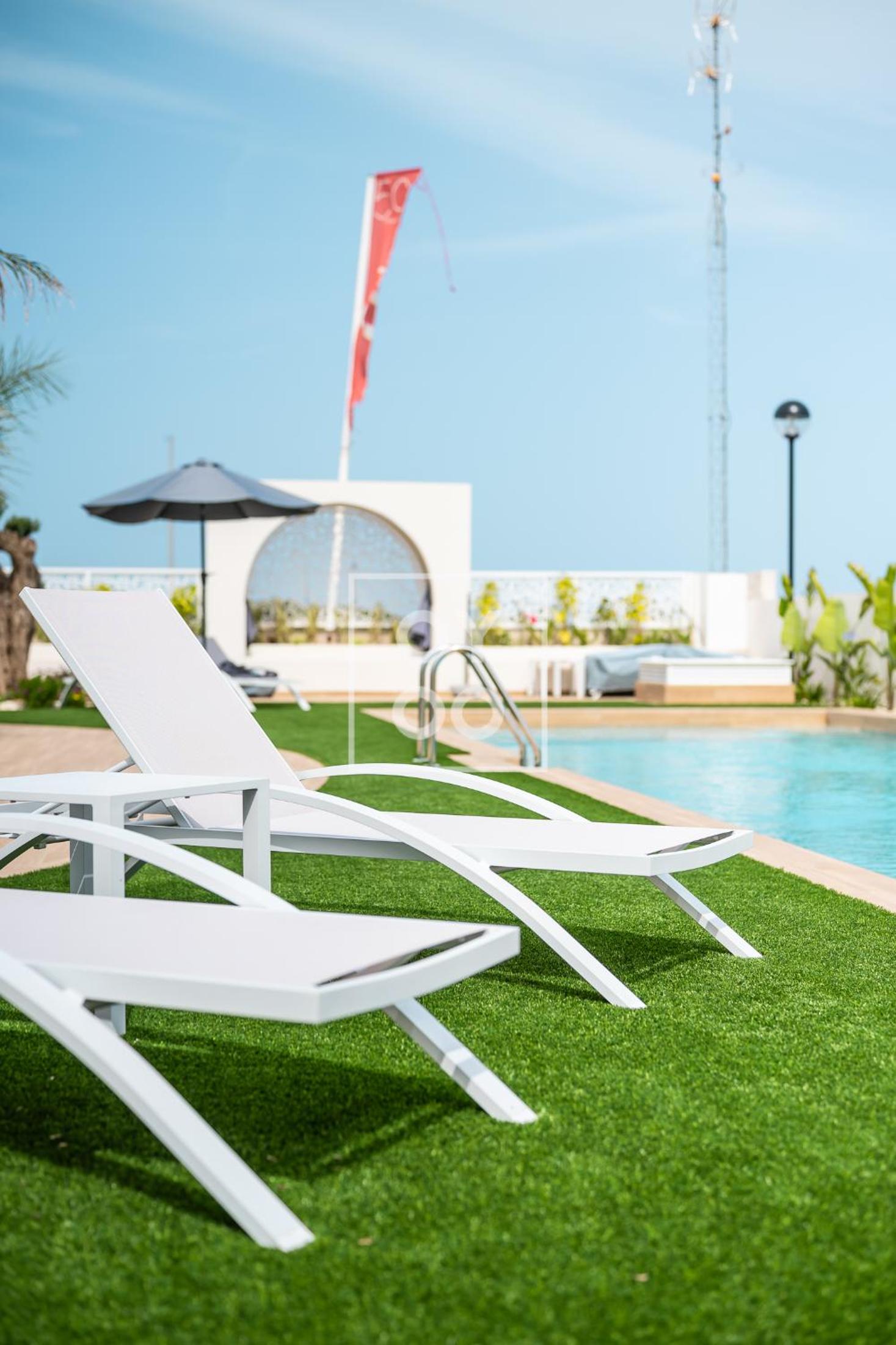 The Q Penthouse, apt with boho-chic rooftop, by OYOOSTAYS