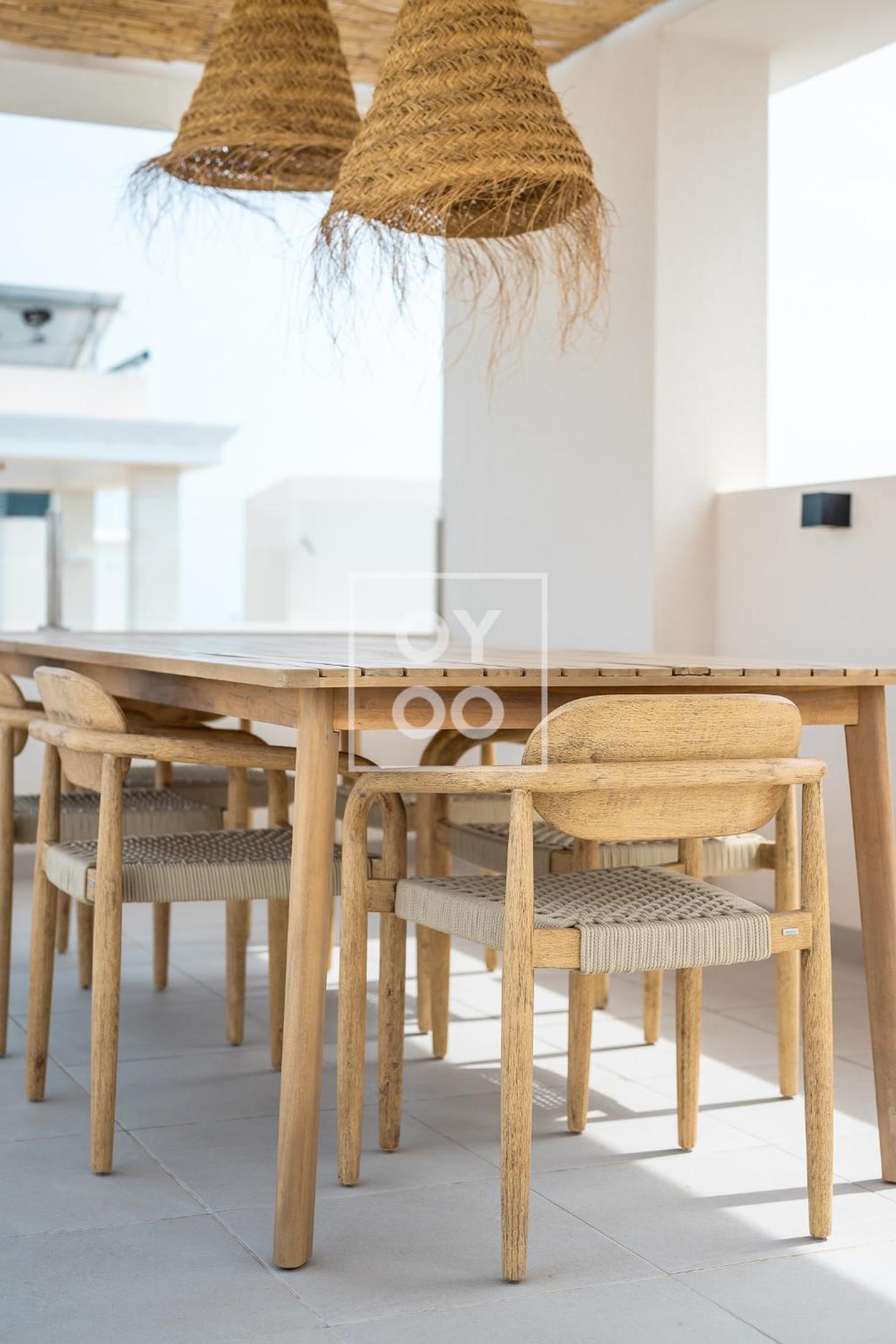 The Q Penthouse, apt with boho-chic rooftop, by OYOOSTAYS
